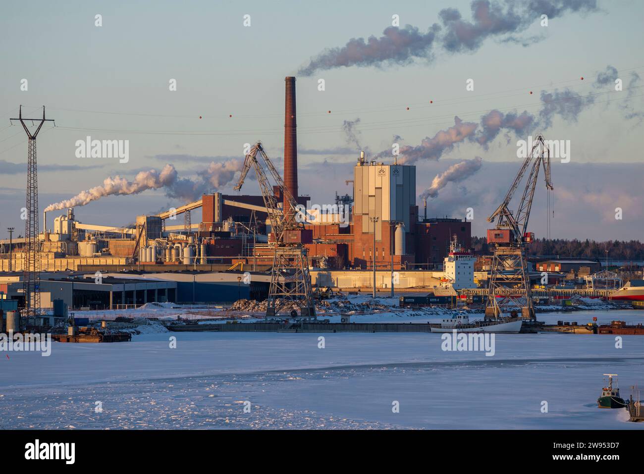 KOTKA, FINLAND - MARCH 08, 2019: Pulp and paper mill 'Sunila' on a lilac March evening Stock Photo
