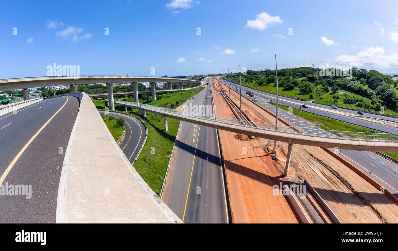 Driving road highway overhead ramps through construction expansion ...