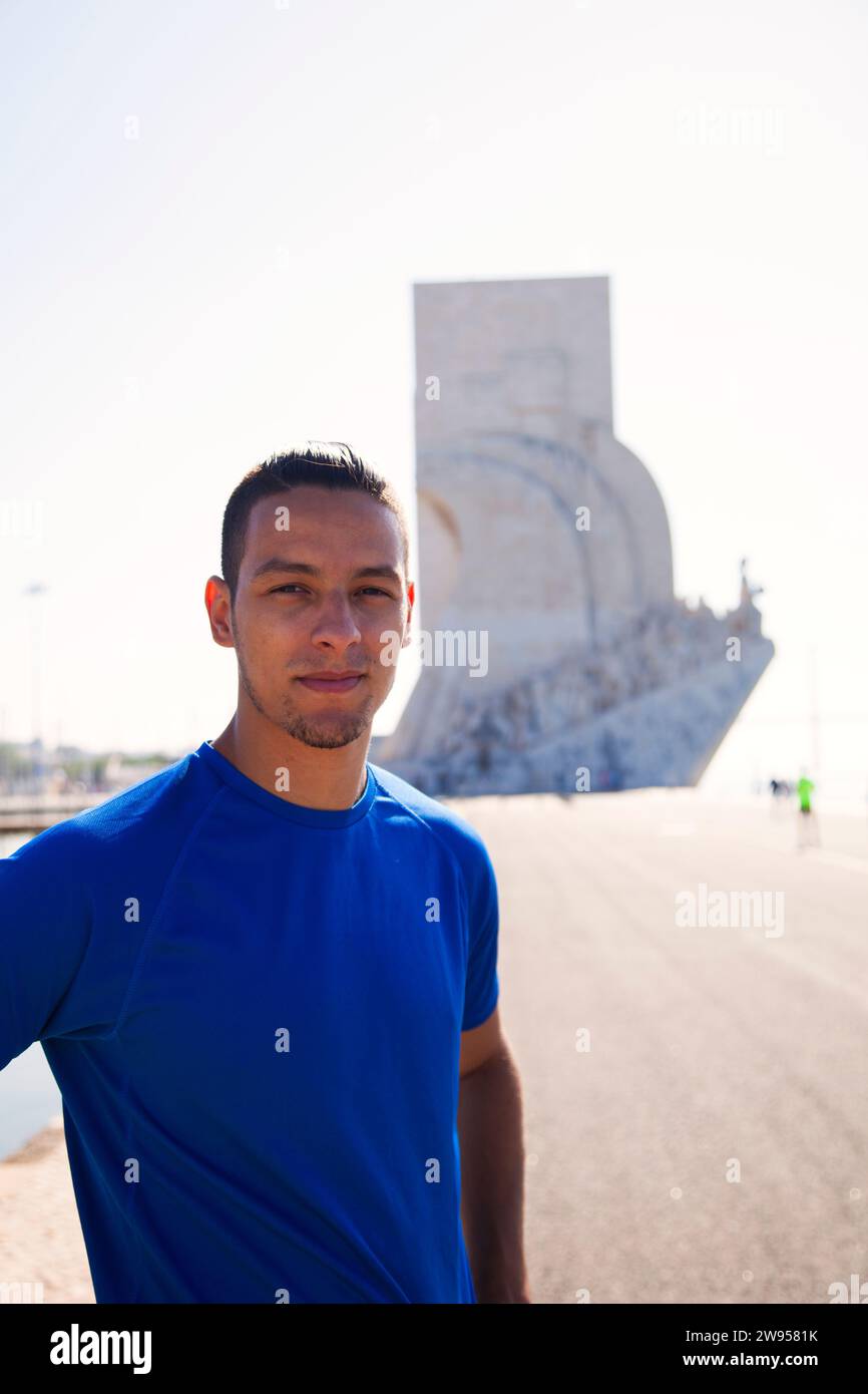 Sport man next to Padrão dos Descobrimentos at Lisbon, Portugal Stock ...