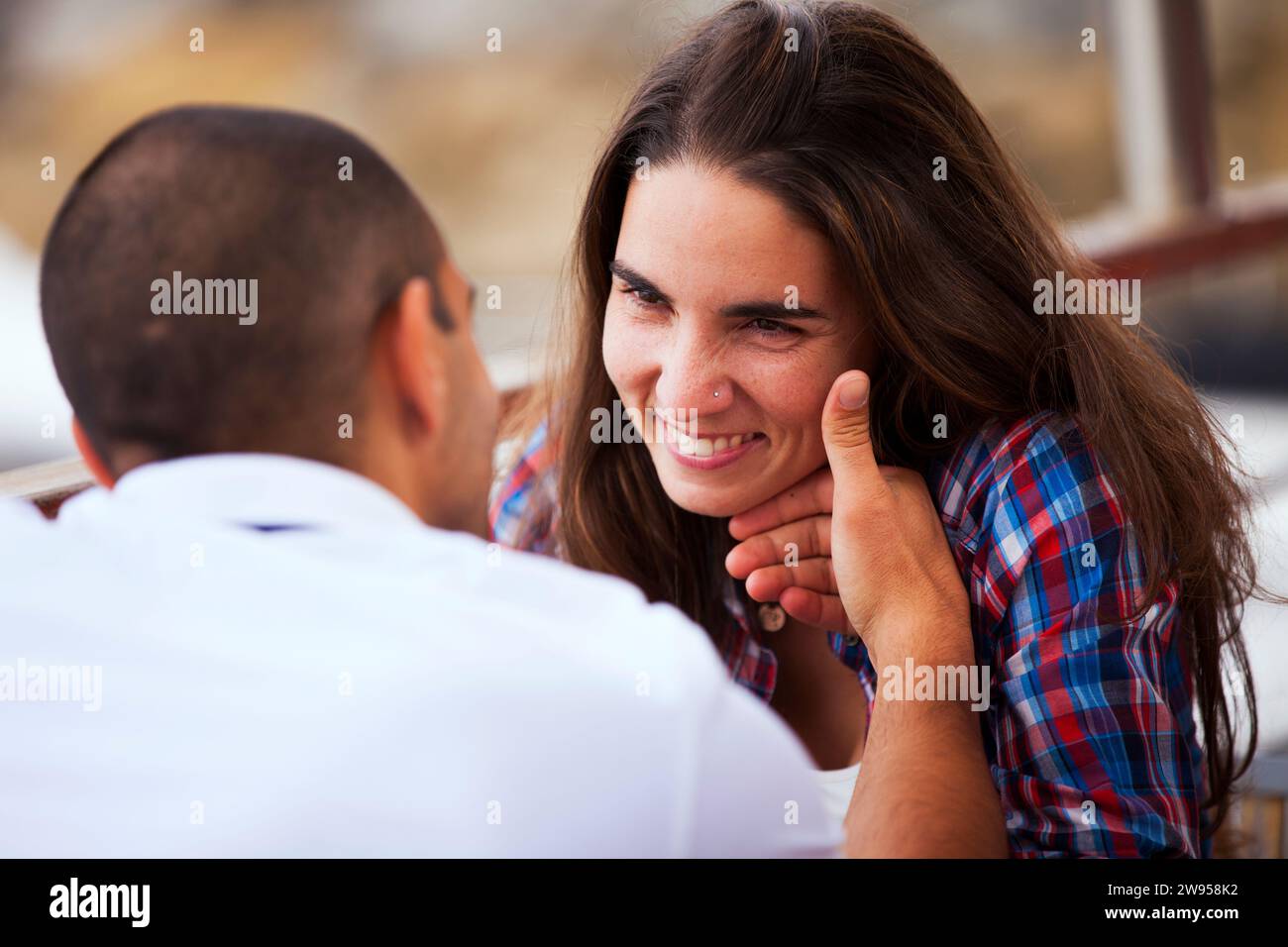 Couple having fun in an outdoor bar Stock Photo Alamy