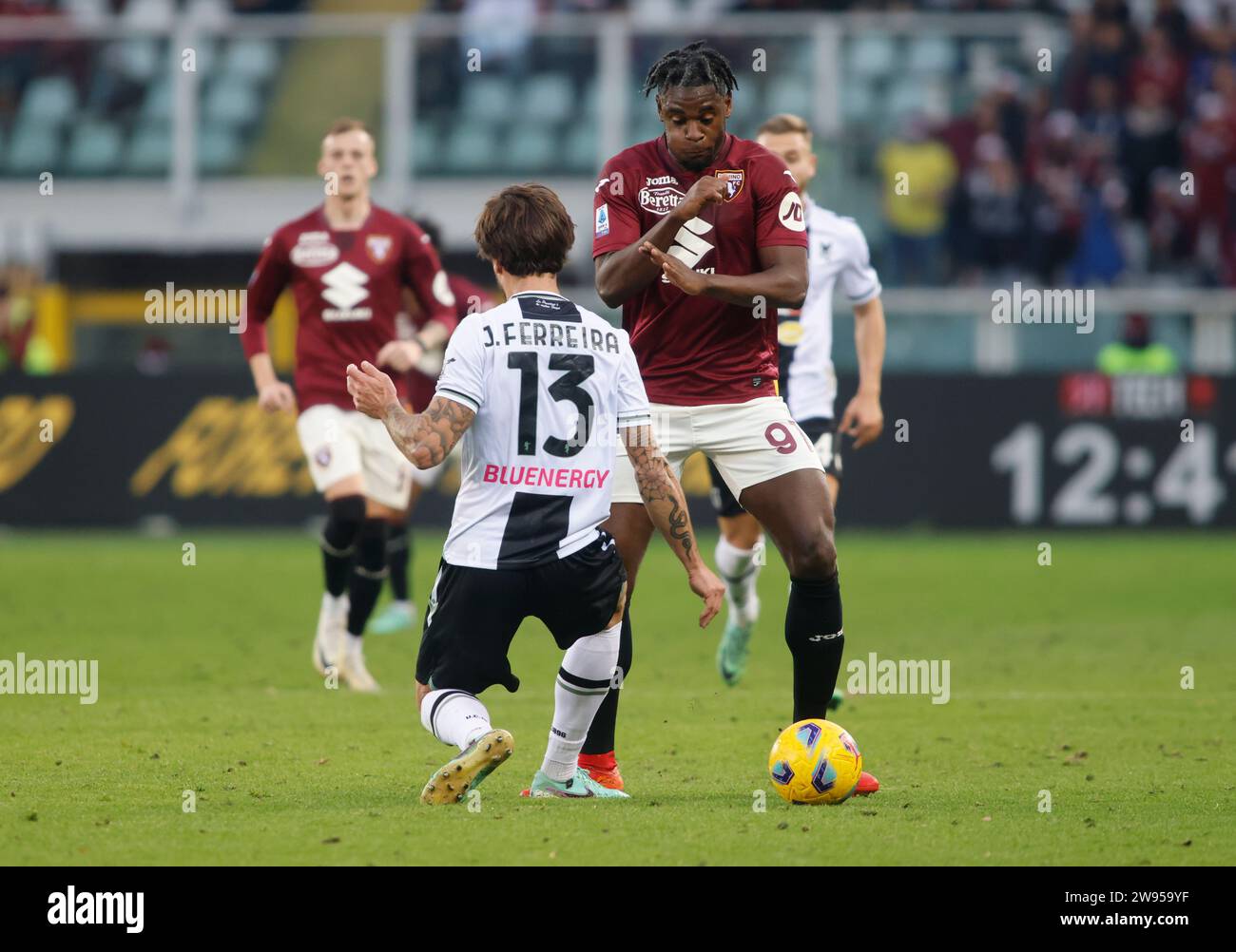Torino, Italy. 23rd Dec, 2023. Joao Ferreira of Udinese Calcio (L) and
