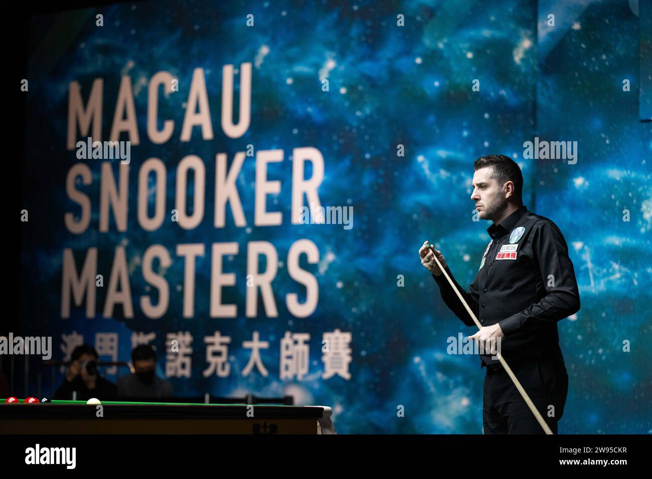Macao, China. 24th Dec, 2023. Mark Selby of England competes against