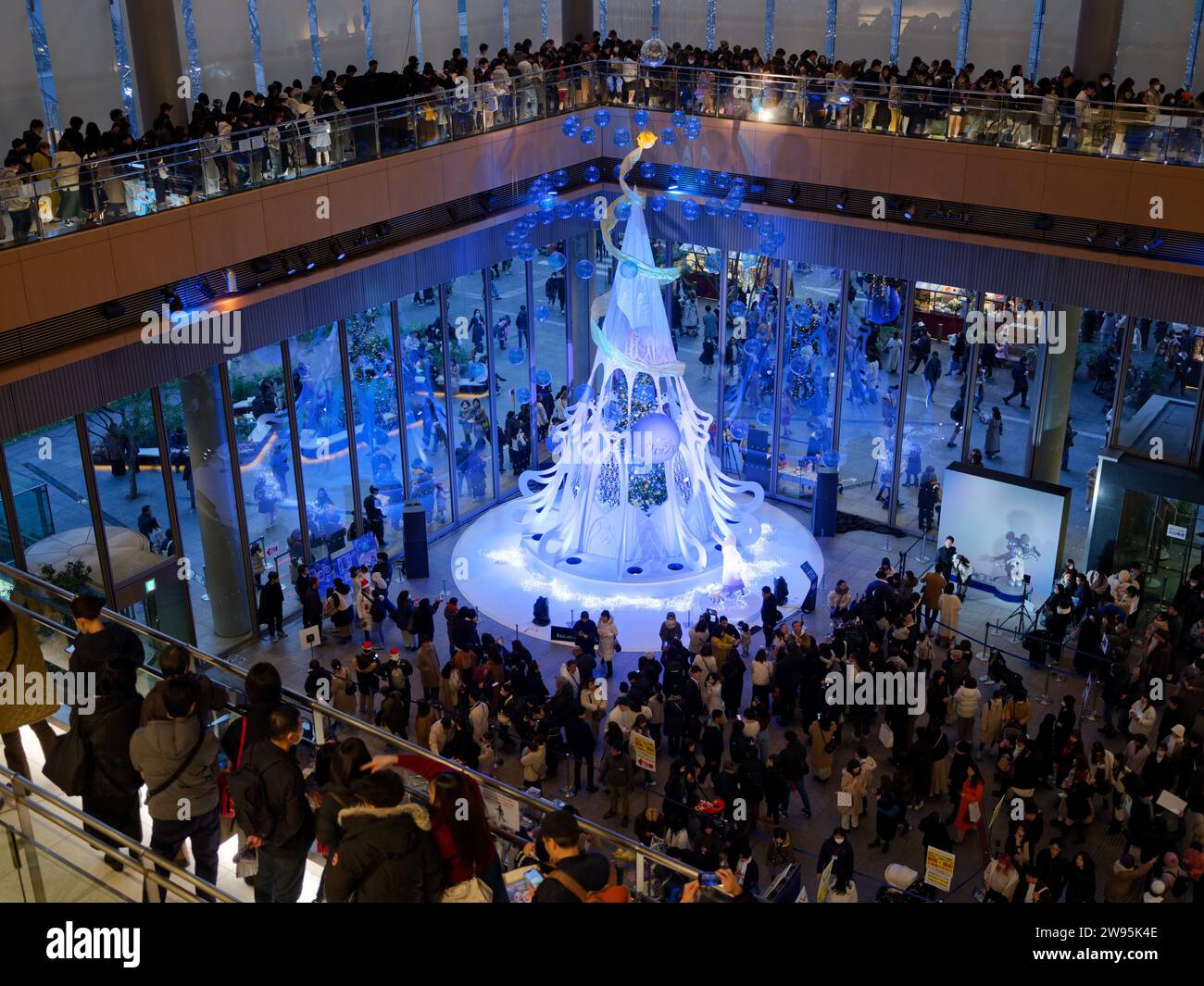Tokyo, Japan. 24th Dec, 2023. People visit a special Christmas tree in ...