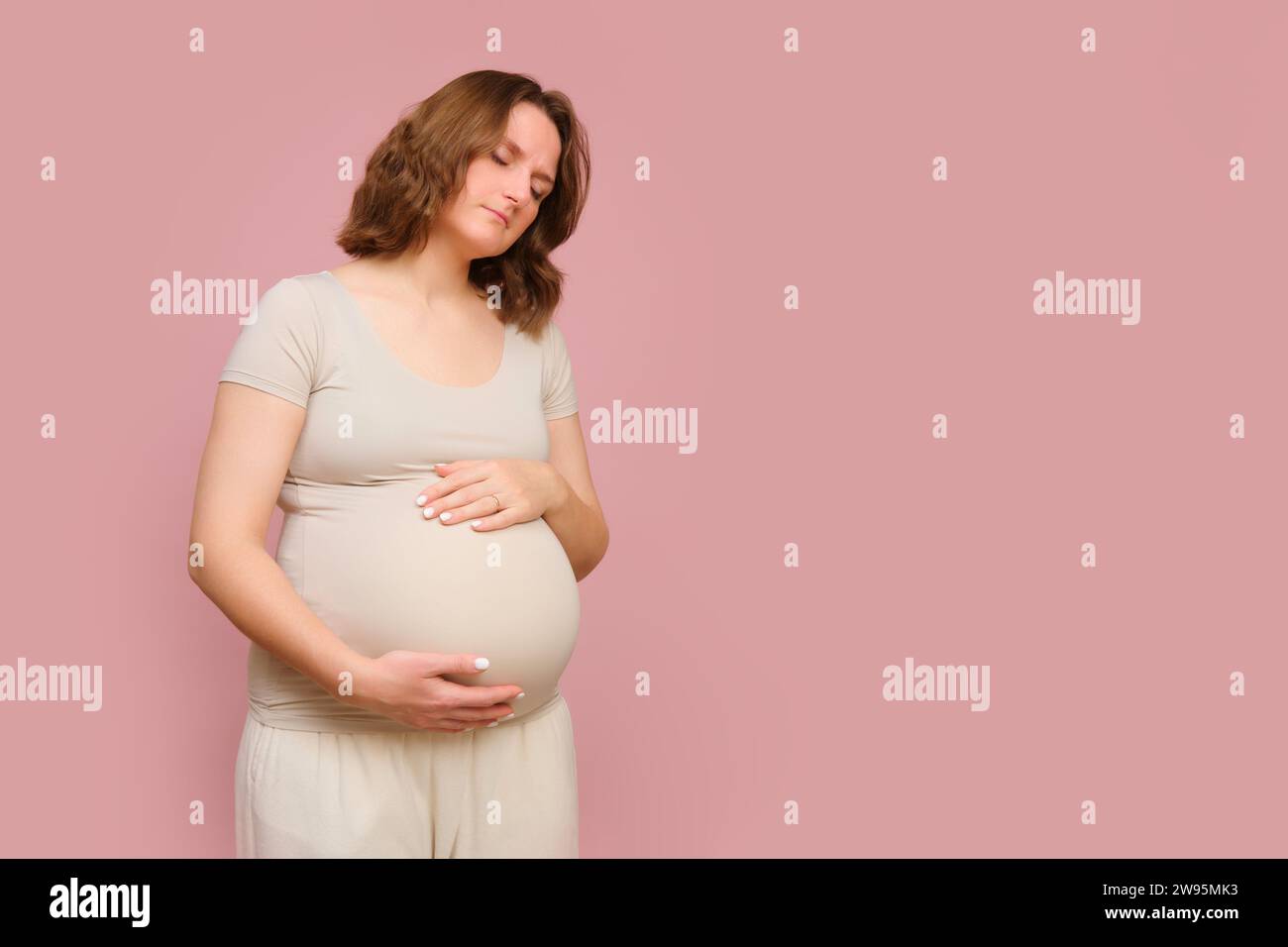 Tired pregnant mother child hi-res stock photography and images