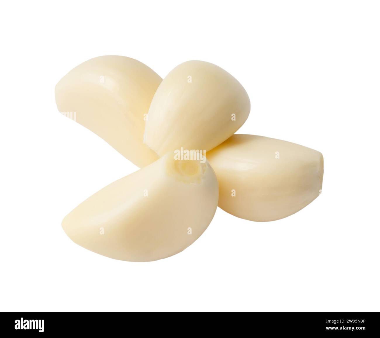 Top view peeled garlic cloves in stack are isolated on white background ...