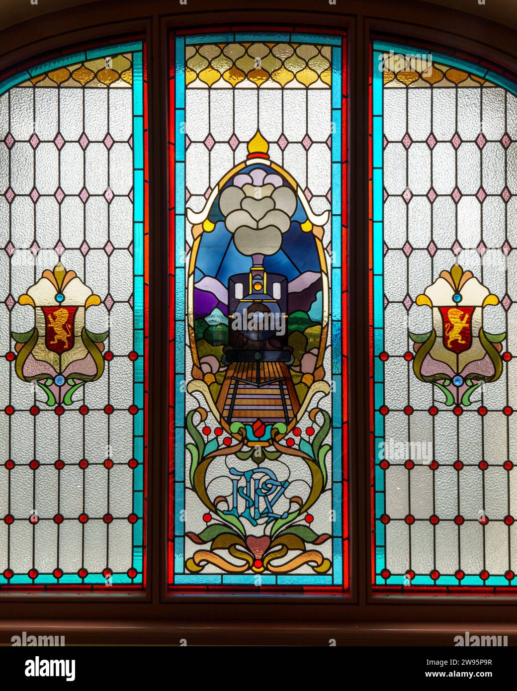The stained-glass window over the main entrance to the Dunedin Railway Station Stock Photo