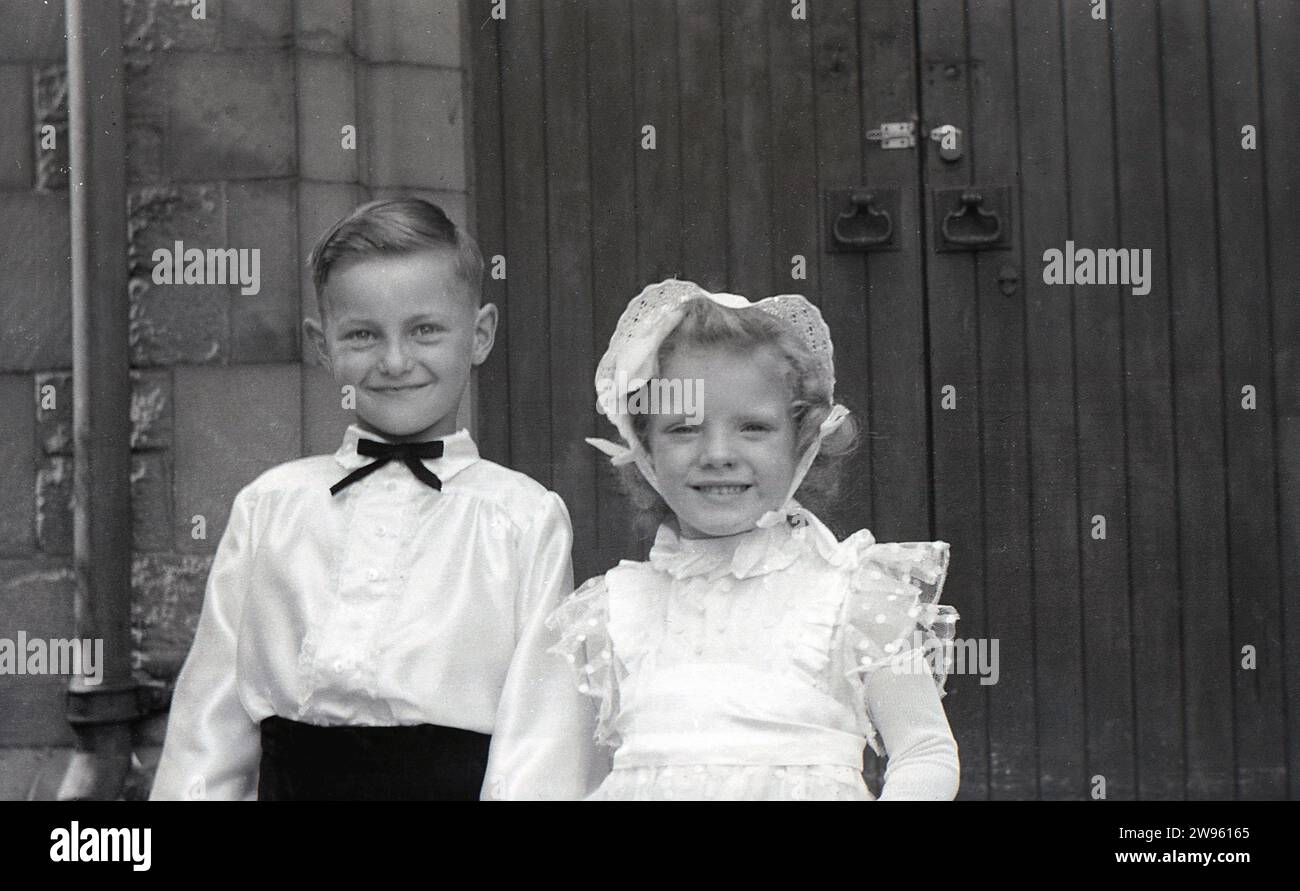 1950s, historical, wedding, big smiles from the page boy and flower