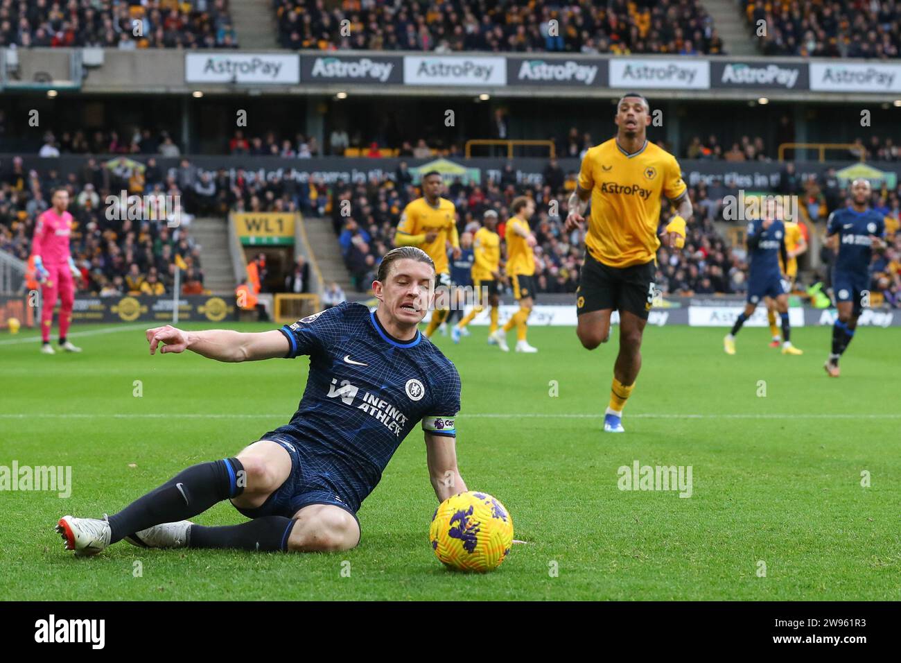Wolverhampton, UK. 24th Dec, 2023. Conor Gallagher of Chelsea keeps the ball in play during the Premier League match Wolverhampton Wanderers vs Chelsea at Molineux, Wolverhampton, United Kingdom, 24th December 2023 (Photo by Gareth Evans/News Images) Credit: News Images LTD/Alamy Live News Stock Photo