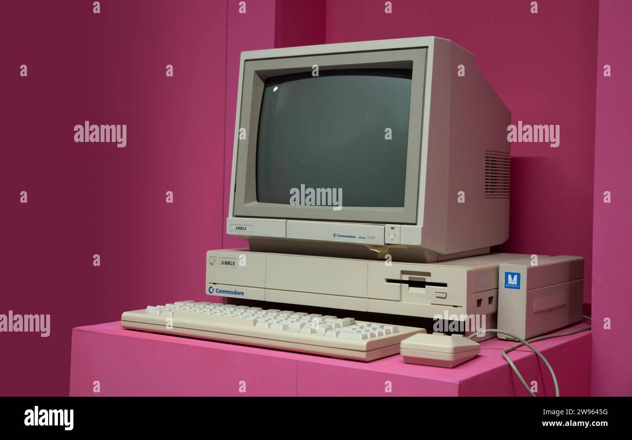 Commodore Amiga (1986). Commodore was an American computer company. Pink background Stock Photo