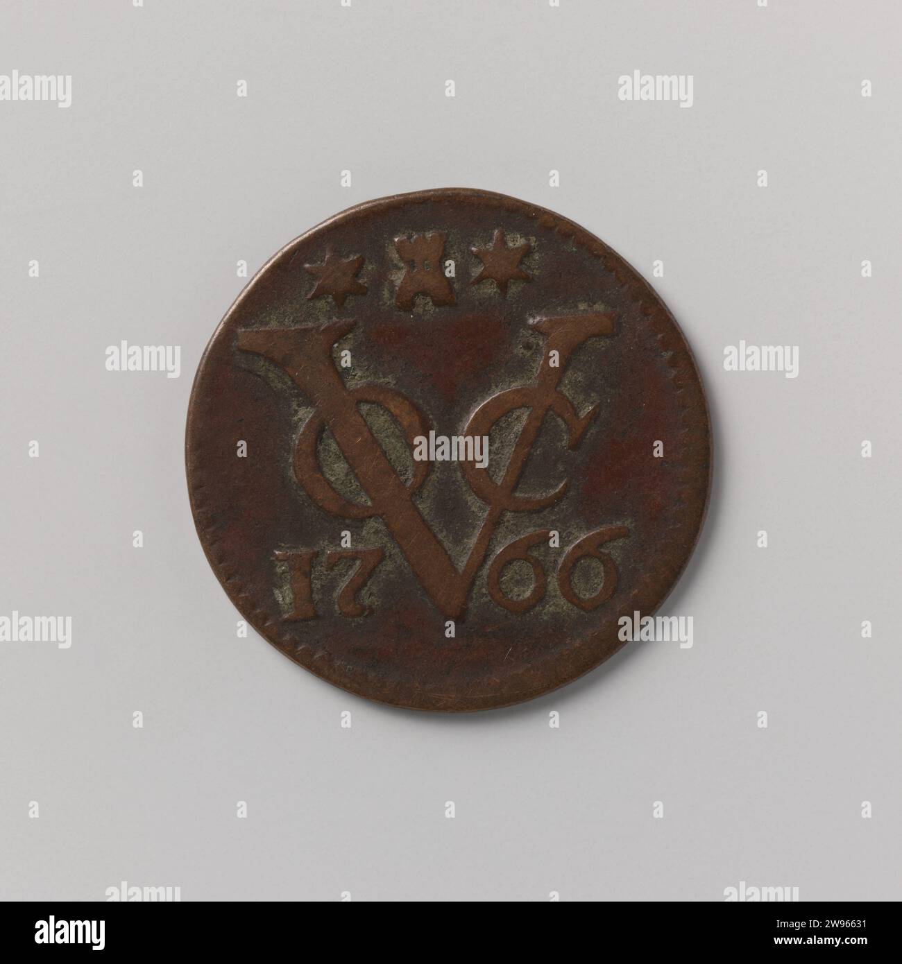 Dang of the VOC from Zeeland, 1766, United Oostindische Compagnie, 1766 coin Copper mint. Front: crowned coat of arms of Zeeland. Reverse: monogram of the VOC, above which mint sign and including the year. Smooth edge. Middelburg copper (metal) striking (metalworking) Stock Photo