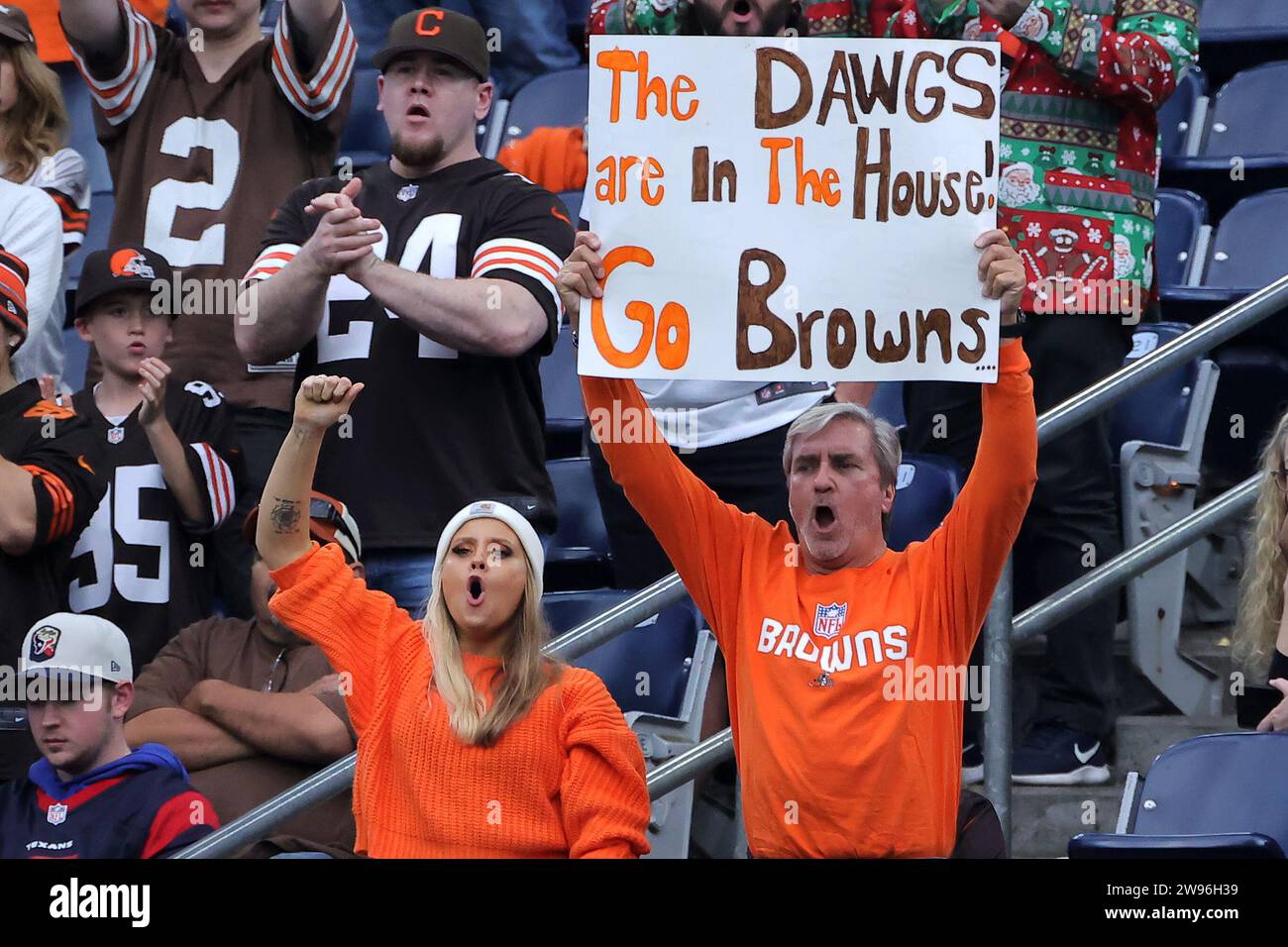 Houston, Texas, USA. 24th Dec, 2023. Cleveland Browns fans cheer the action from the stands during the fourth quarter between the Houston Texans and the Cleveland Browns at NRG Stadium in Houston, TX on December 24, 2023. (Credit Image: © Erik Williams/ZUMA Press Wire) EDITORIAL USAGE ONLY! Not for Commercial USAGE! Stock Photo