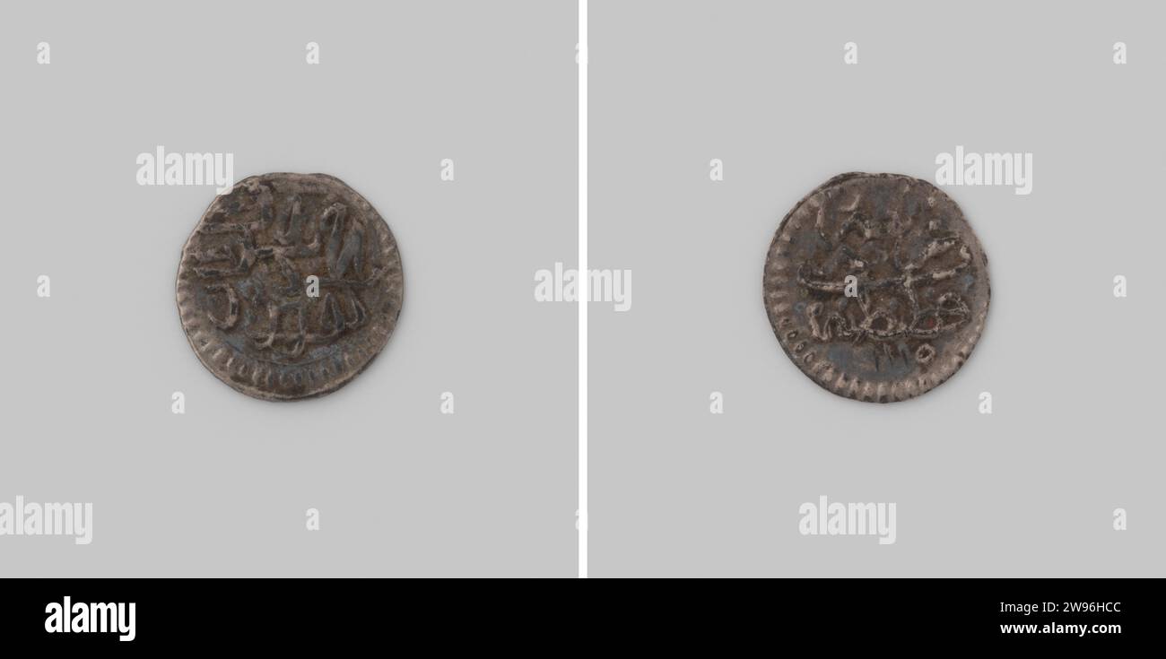 Akce from Turkey by Sultan Ahmed III, 1115-1143 [= 1703-1730] ,, 1703 coin Silver coin. Front: three -faced inscription in Arabic letters. Roun: three-line inscription in Arabic letters, with coinage designation: Constantinople. This year: 1115 Constantinople silver (metal) striking (metalworking) Stock Photo
