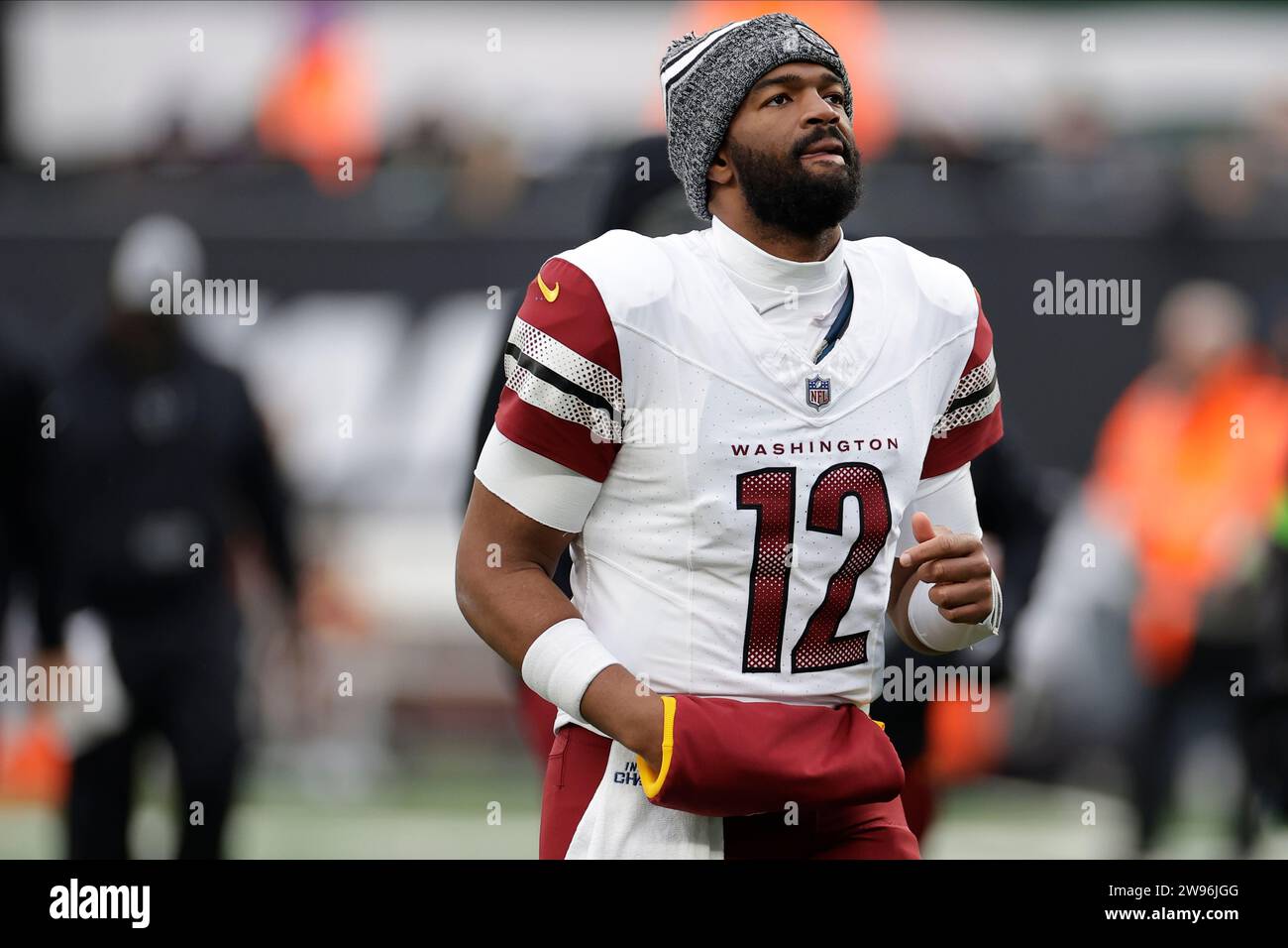 Washington Commanders quarterback Jacoby Brissett (12) walks off the ...