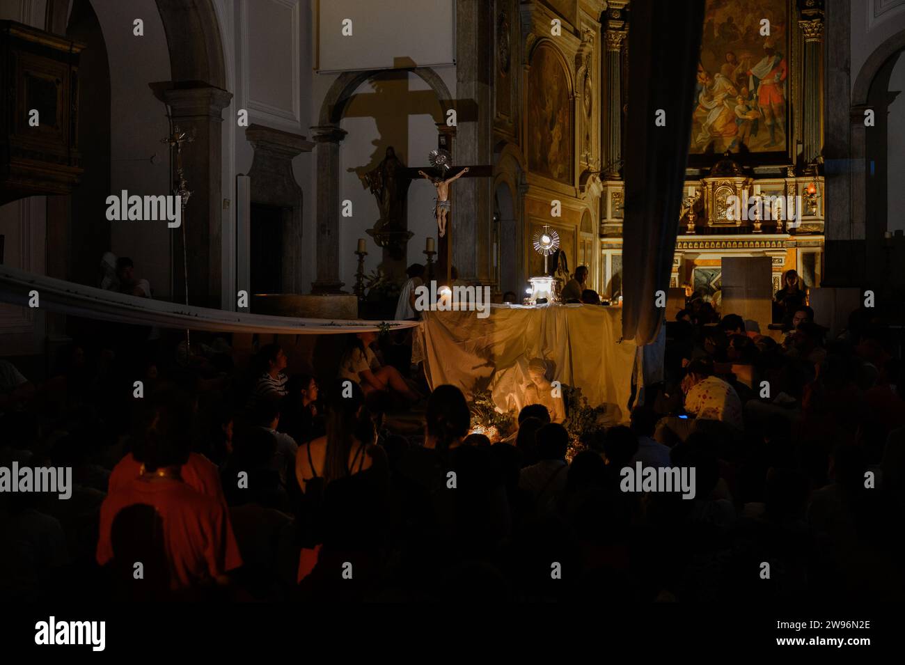 Adoration of the Blessed Sacrament during WYD 2023 accompanied by Hakuna Group Music. Church of the Three Saint Magi (Igreja dos Santos Reis Magos). Stock Photo