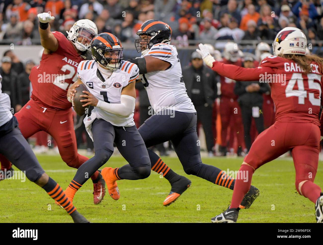 Chicago, United States. 24th Dec, 2023. Chicago Bears quarterback Justin Fields (1) looks for and opening Arizona Cardinals at Soldier Field in Chicago on Sunday, December 24, 2023. Photo by Mark Black/UPI Credit: UPI/Alamy Live News Stock Photo