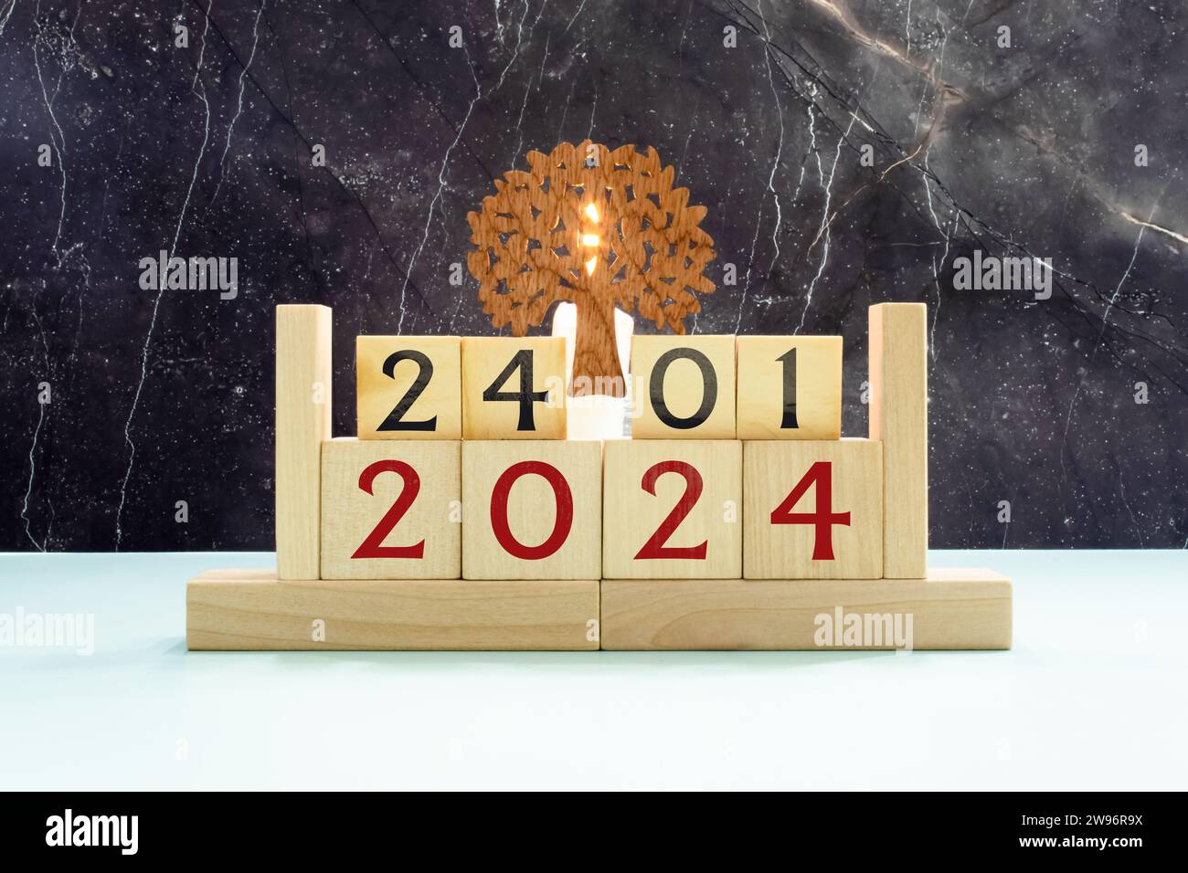 January 24 calendar date text on wooden blocks with blurred background park. Copy space and calendar concept Stock Photo