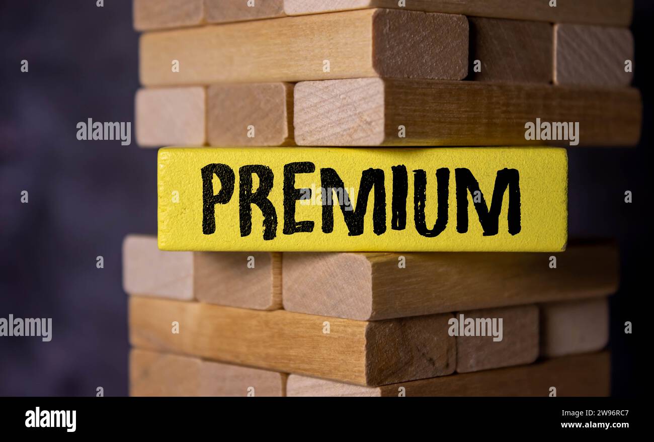 The word premium on lightbox isolated pink background. Premium Membership Concept Stock Photo