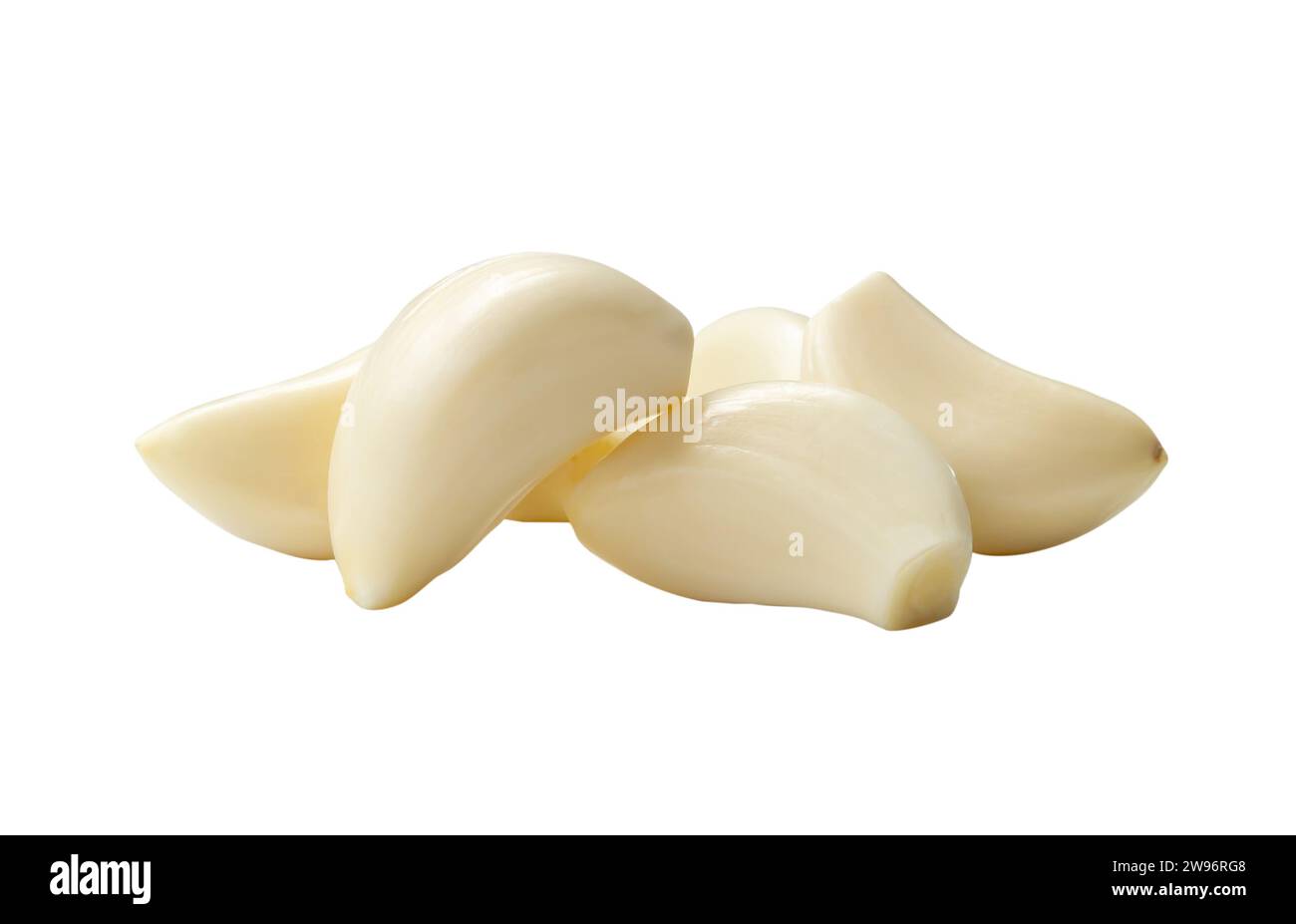 Peeled garlic cloves in stack are isolated on white background with ...