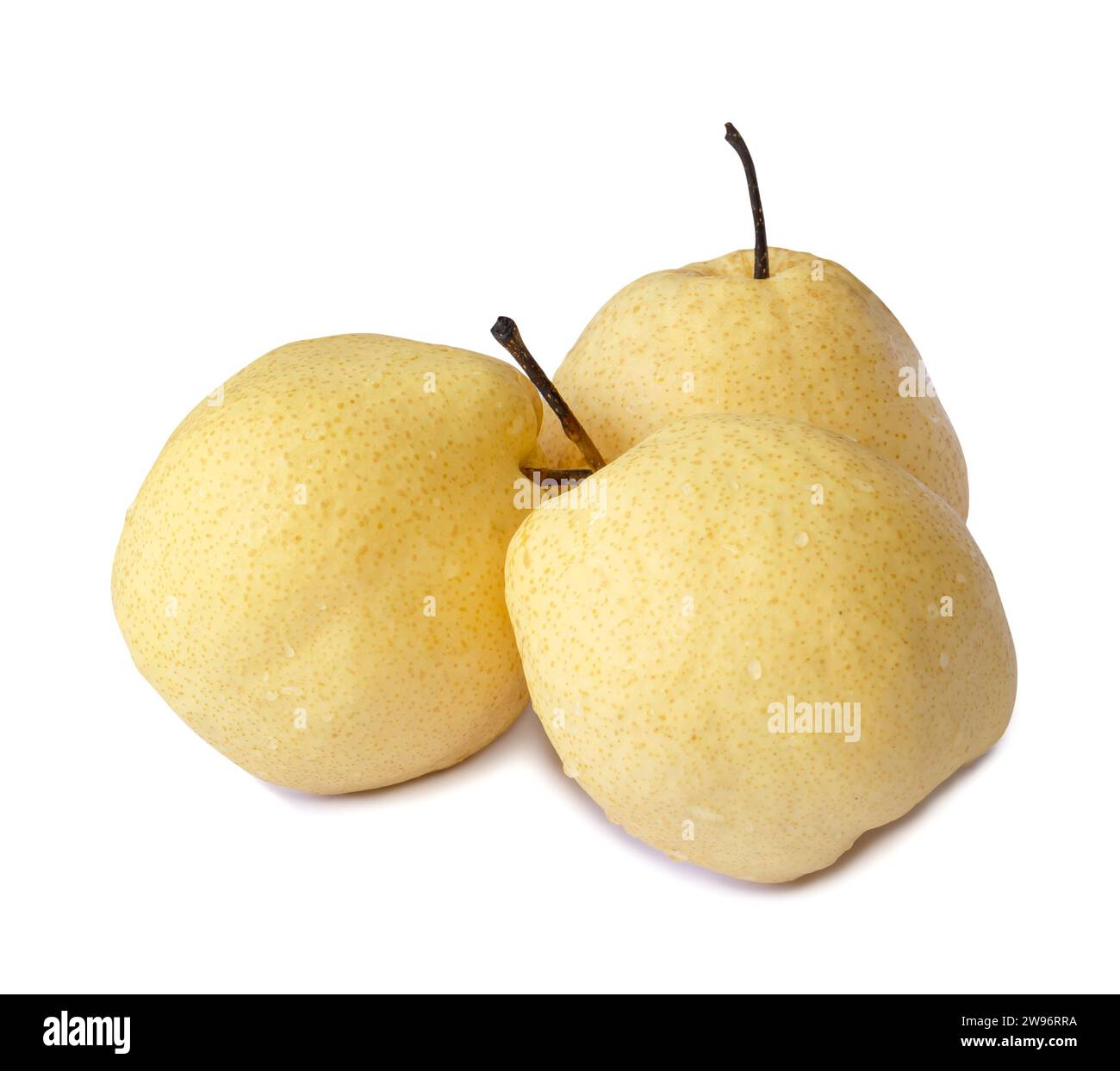 Three fresh yellow Chinese pears are isolated on white background with clipping path Stock Photo