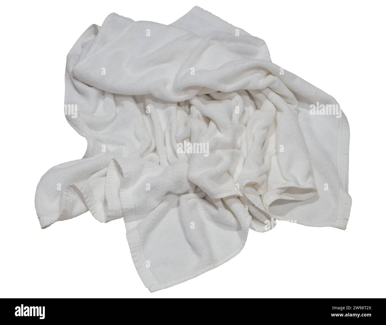 White crumpled towel after use is isolated on white background with cllipping path. Stock Photo