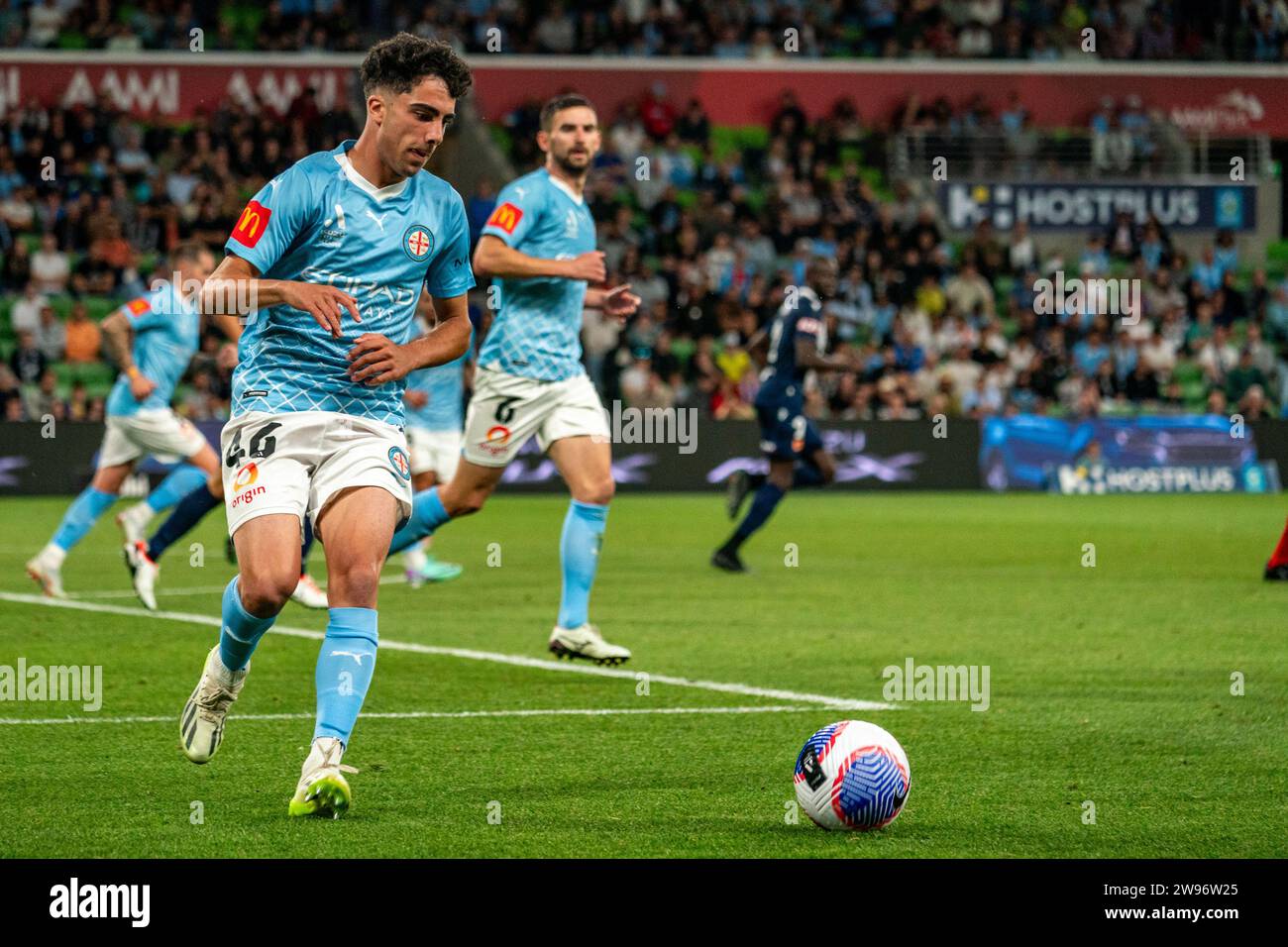 Melbourne, Australia. 23 December, 2023. Melbourne City FC Forward Benjamin Mazzeo (#46) prepares to clear the ball out from defence during the Isuzu UTE A-League match between Melbourne City FC and Melbourne Victory FC at AAMI Park in Melbourne, Australia. Credit: James Forrester/Alamy Live News Stock Photo