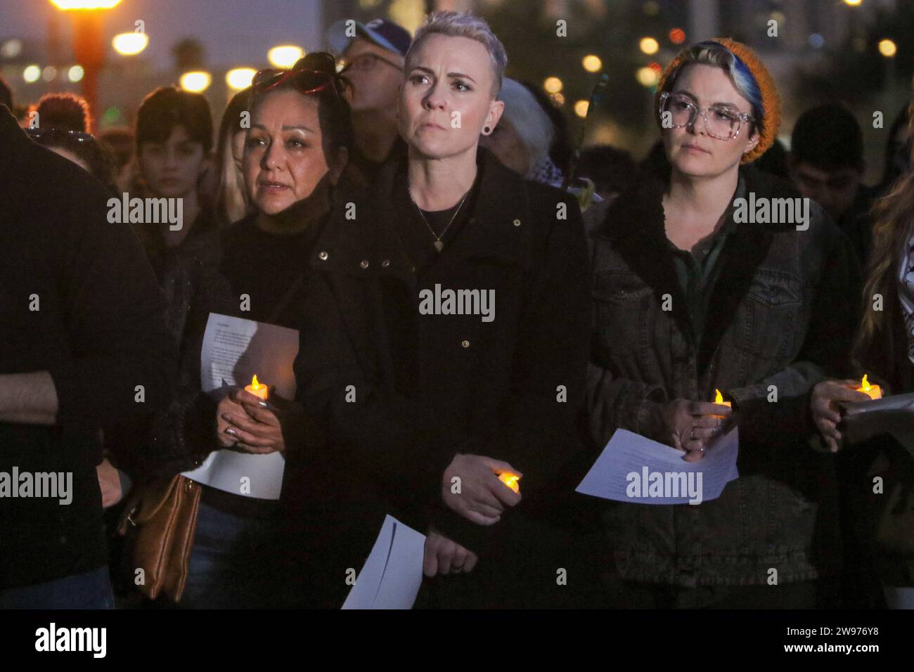 People gathered for a peaceful candlelight vigil with songs and prayers