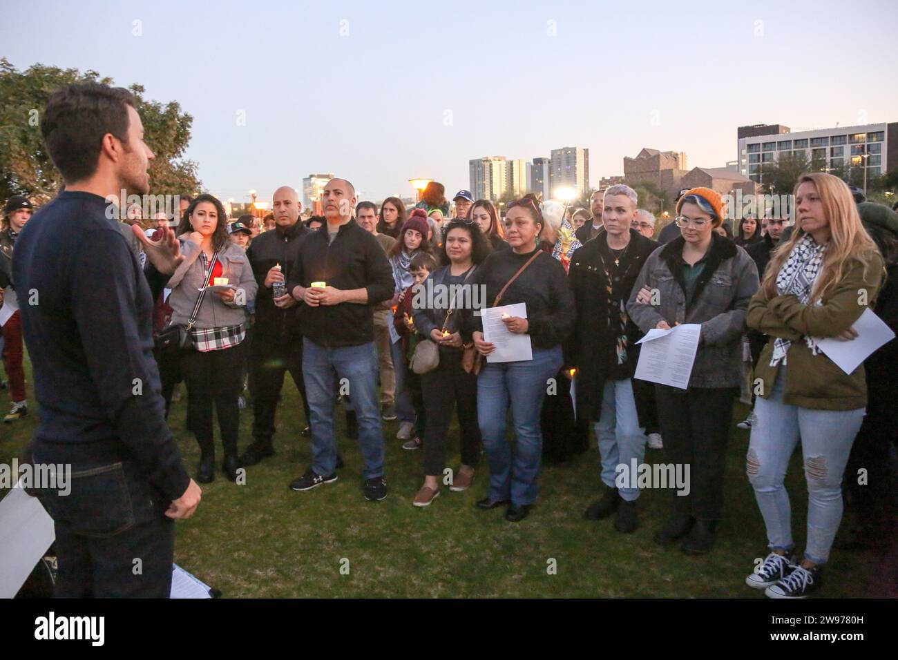People gathered for a peaceful candlelight vigil with songs and prayers