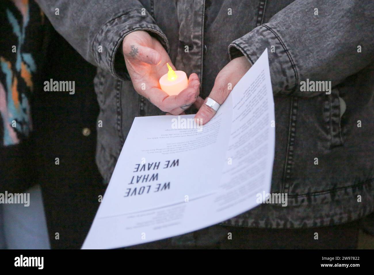 People gathered for a peaceful candlelight vigil with songs and prayers