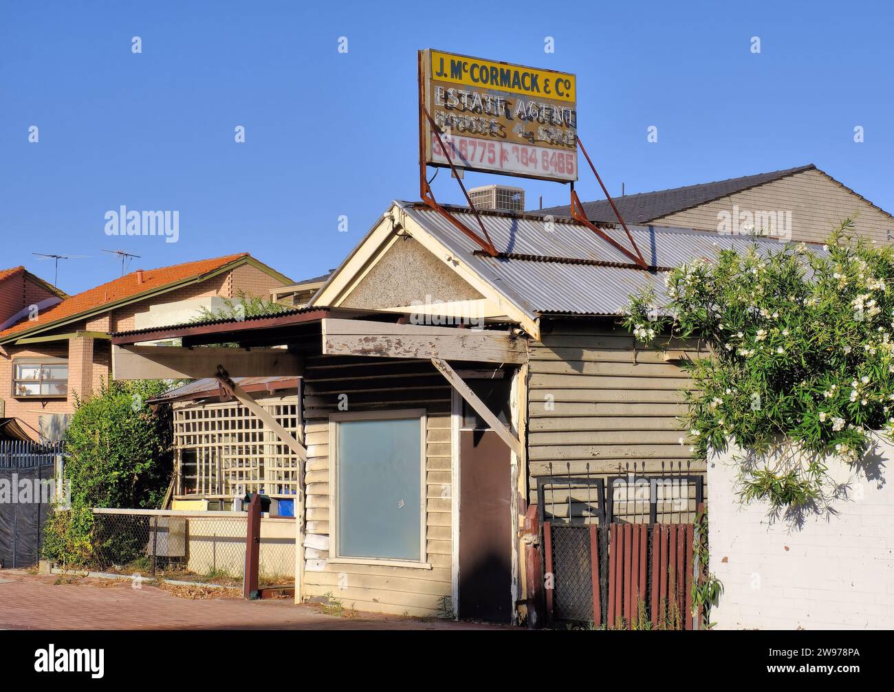 Perth: Old former disused Estate Agent shop with advertising sign on Canning Highway, South Perth, Perth, Western Australia Stock Photo