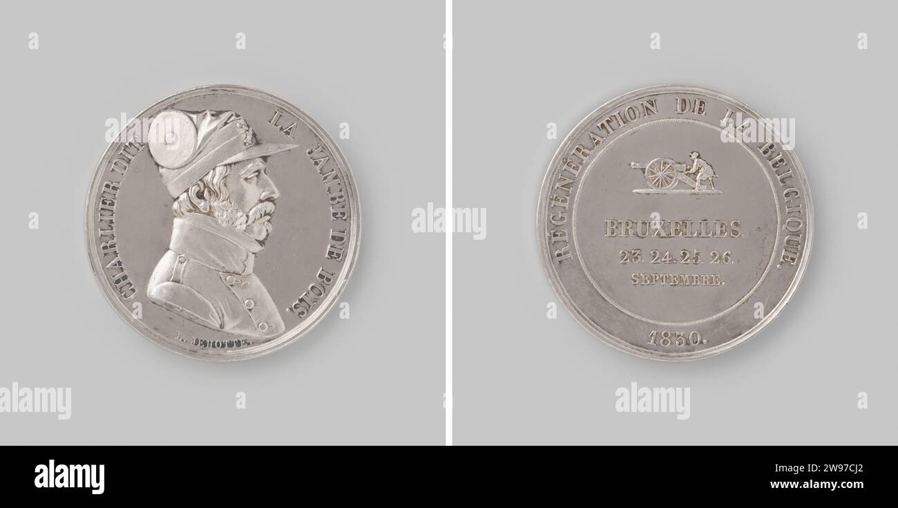 September days in Brussels, in honor of Charlier, nicknamed 'La Jambe de Bois', Léonard Jéhotte, 1830 history medal Silver medal. Front: breastpiece man with army coats inside. Reverse: inscription under the image of man who fires cannon within Covering. Liège silver (metal) striking (metalworking)  Brussels Stock Photo