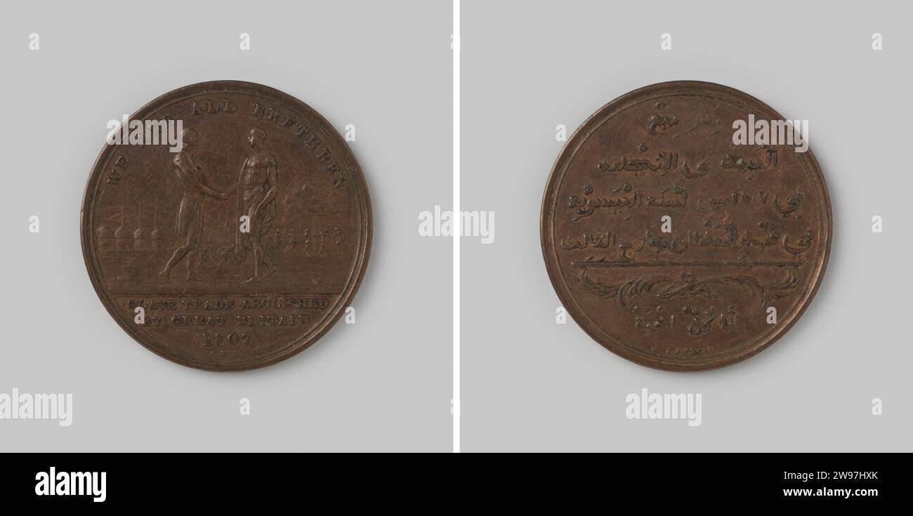 Abolition of the slave trade in England 1807, 1807 history medal Copper medal, on the front an Englishman and an African who push each other hands, in the background on the left a hut village, in the middle workers, and right dancers for the freedom tree, with a change and cutting text, on the reverse three lines of Persian script above one Double line, underneath two together palm branches and another line of Persian script.  copper (metal) striking (metalworking) Stock Photo