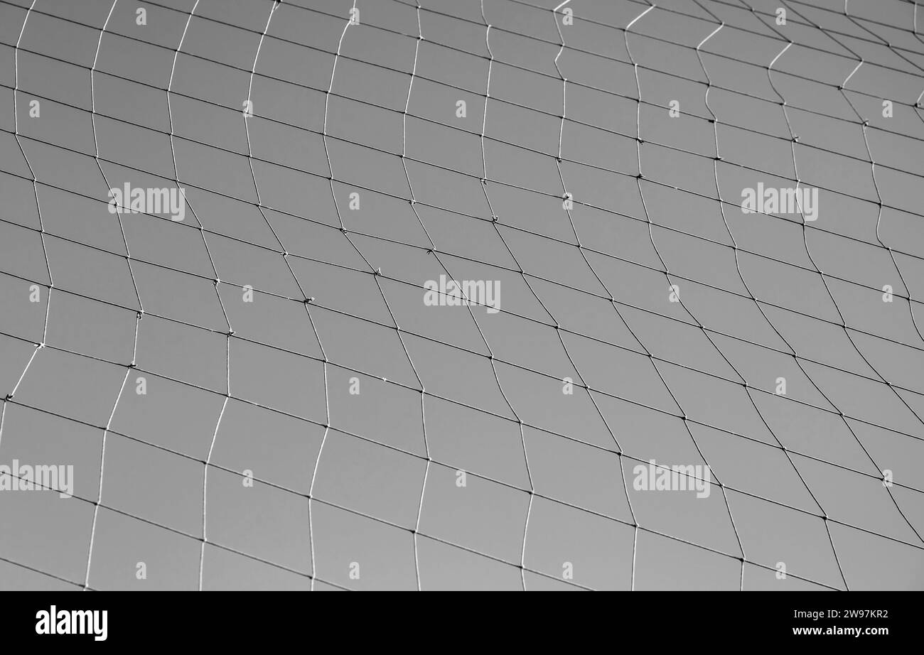 Fishing net over the sky, black and white background photo Stock Photo