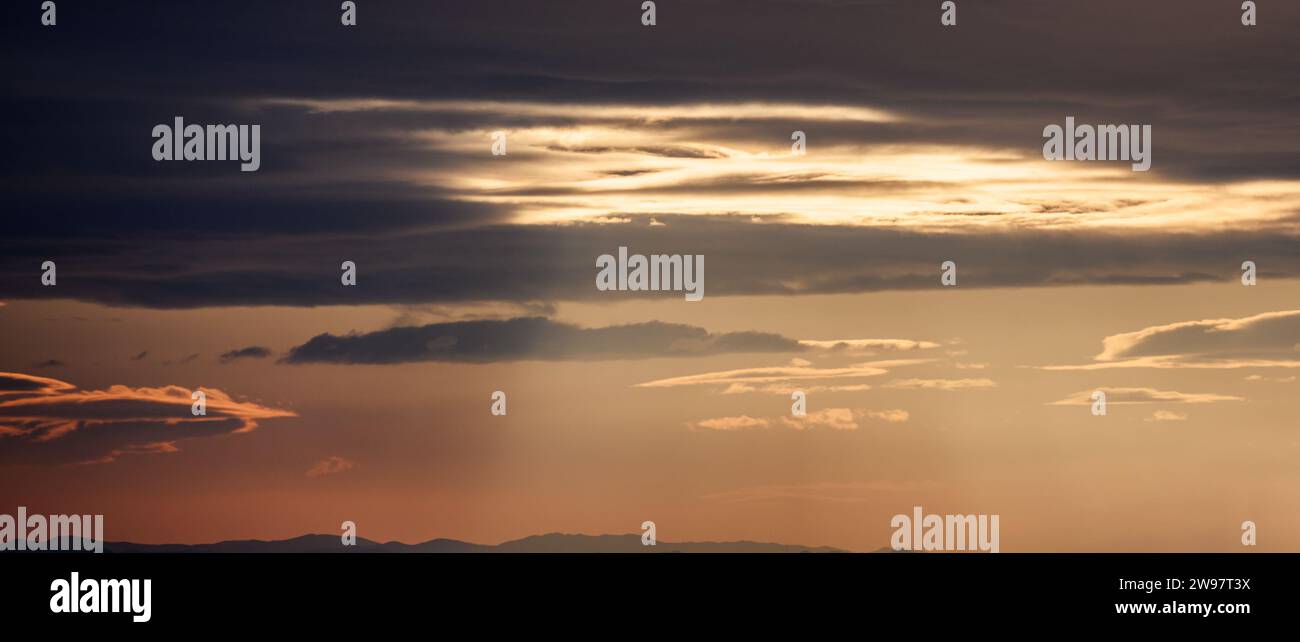 Sunset sky with orange clouds. Nature background Stock Photo - Alamy