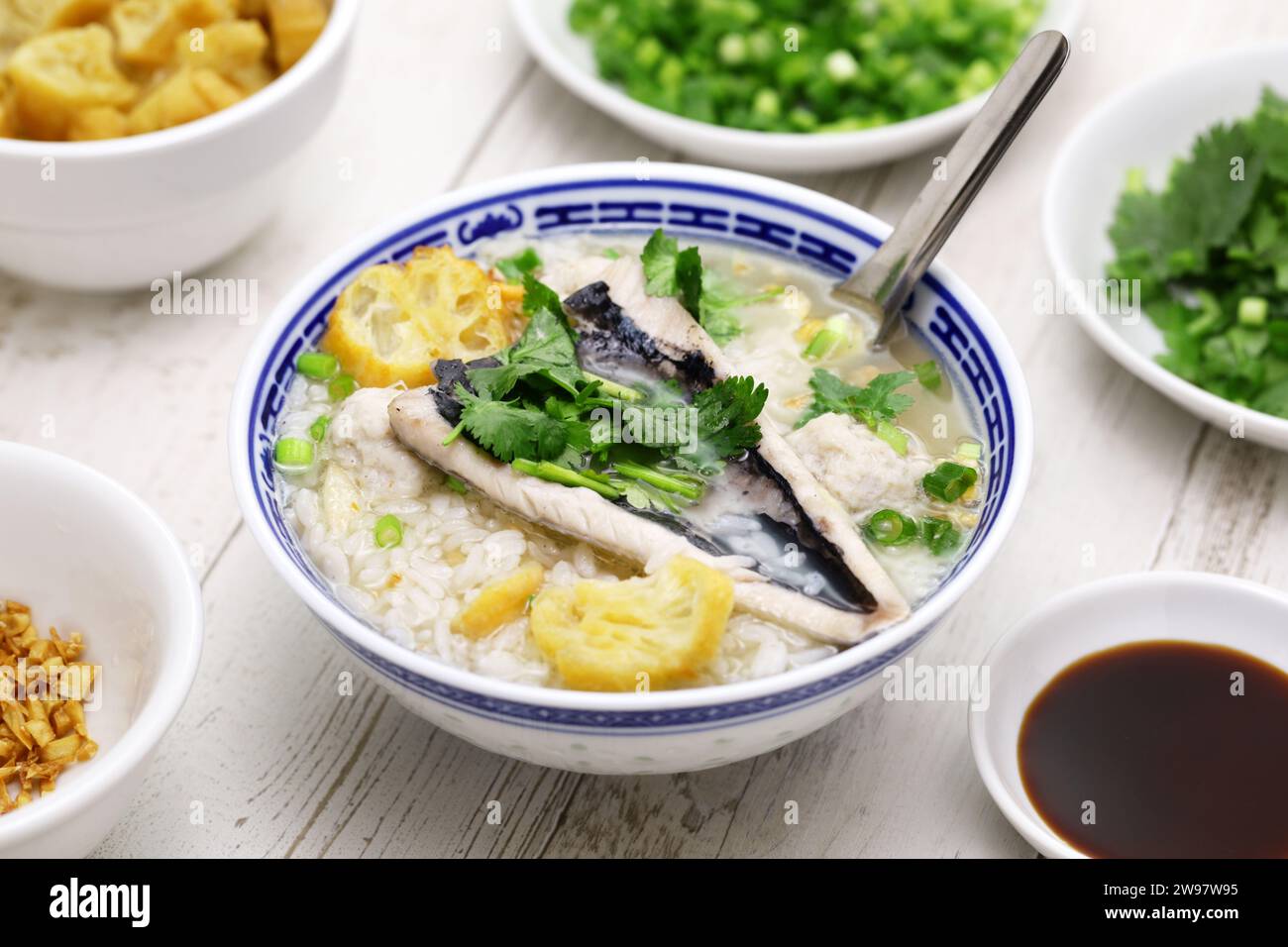 Taiwanese congee with milkfish belly and milkfish balls. Stock Photo