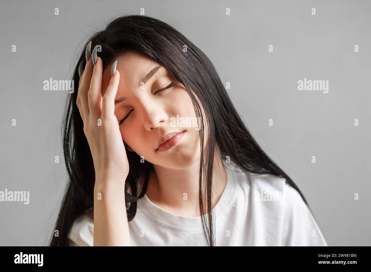 Portrait of a young teenager girl who looks sad. Stock Photo