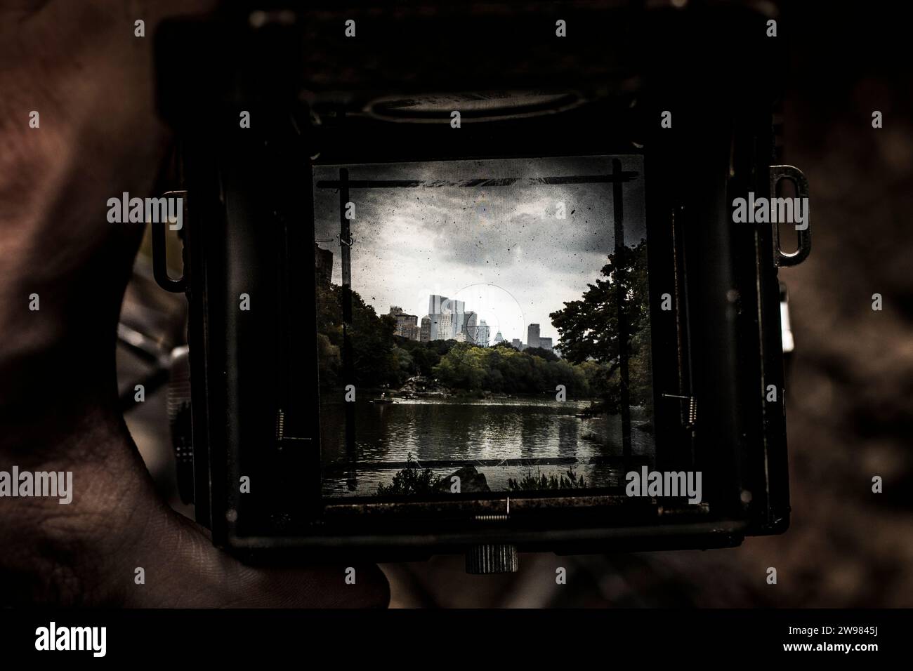 Looking through a vintage camera's viewfinder Stock Photo