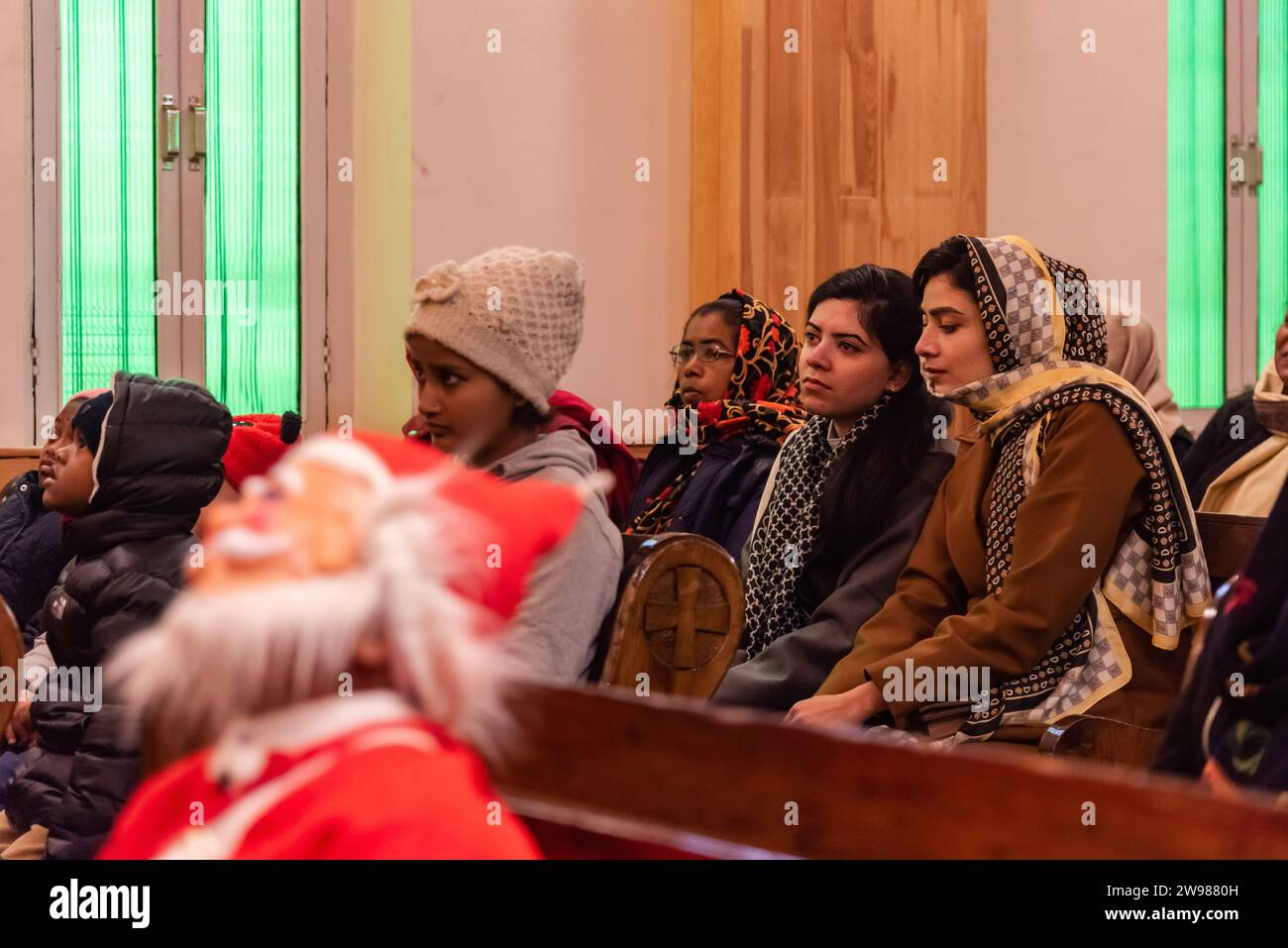 Srinagar, India. 25th Dec, 2023. People offer prayer inside a Church