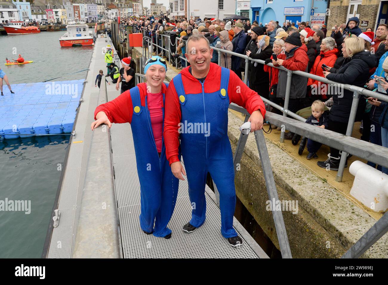 Weymouth, Dorset, UK. 25th December 2023. Hundreds festive revellers in