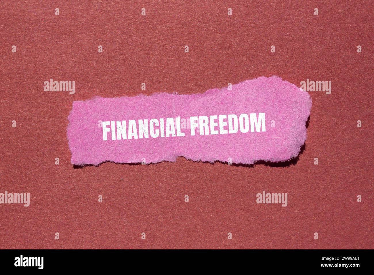 Financial freedom lettering on ripped paper. Business concept Stock ...