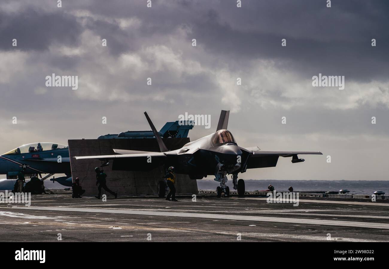 An F-35C Lightning II taxis to the catapult aboard the aircraft carrier USS George Washington (CVN 73), Dec.11, 2023. Photo by August Clawson Stock Photo