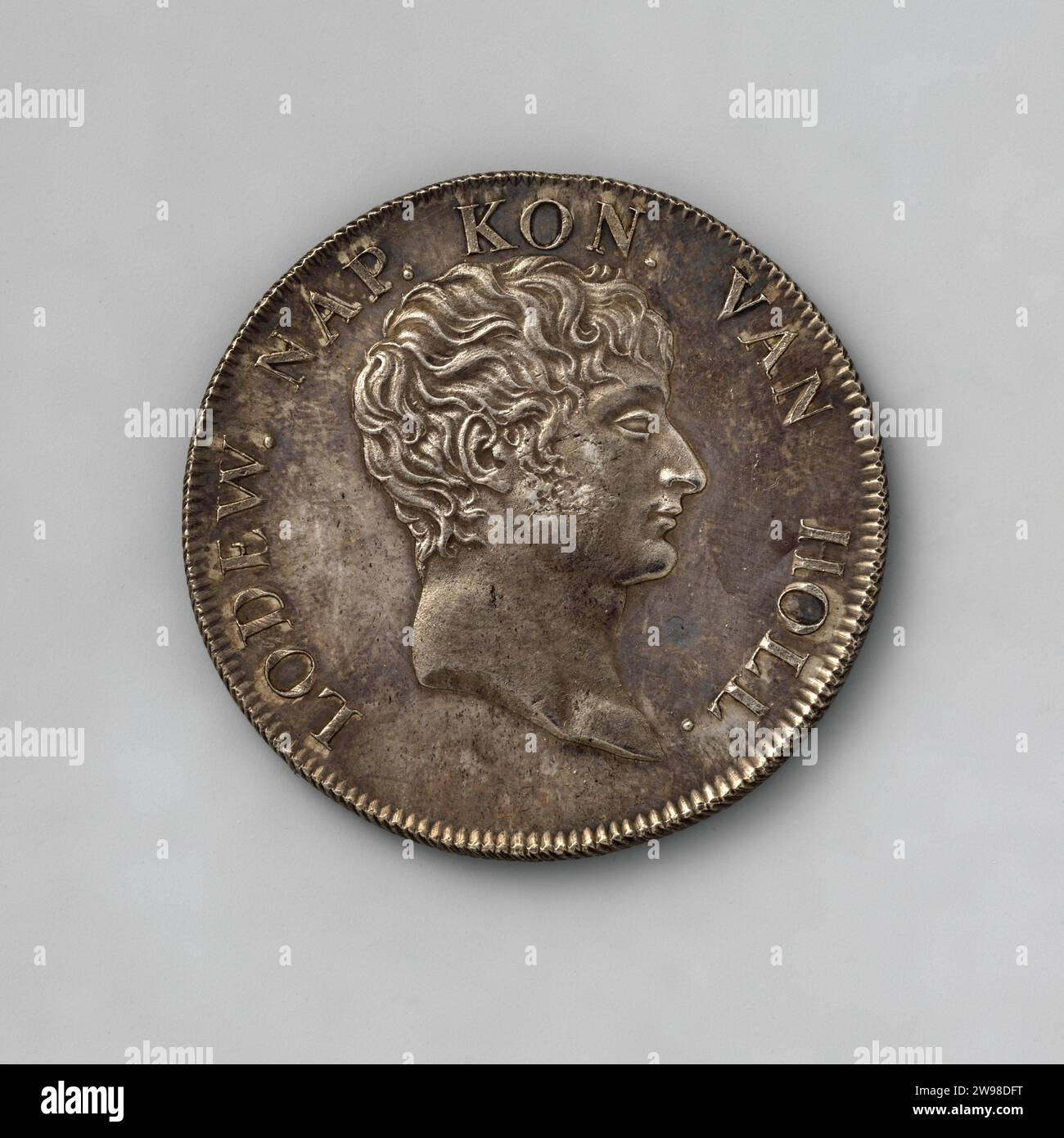 Rijksdaalder of the Kingdom of Holland, 1809; Kingdom of Holland,  Rijksdaalder, 1809. Silver coin. Front: bust of the king to the right.  Reverse: Between name indicator R Dr. Crowned coat of arms,