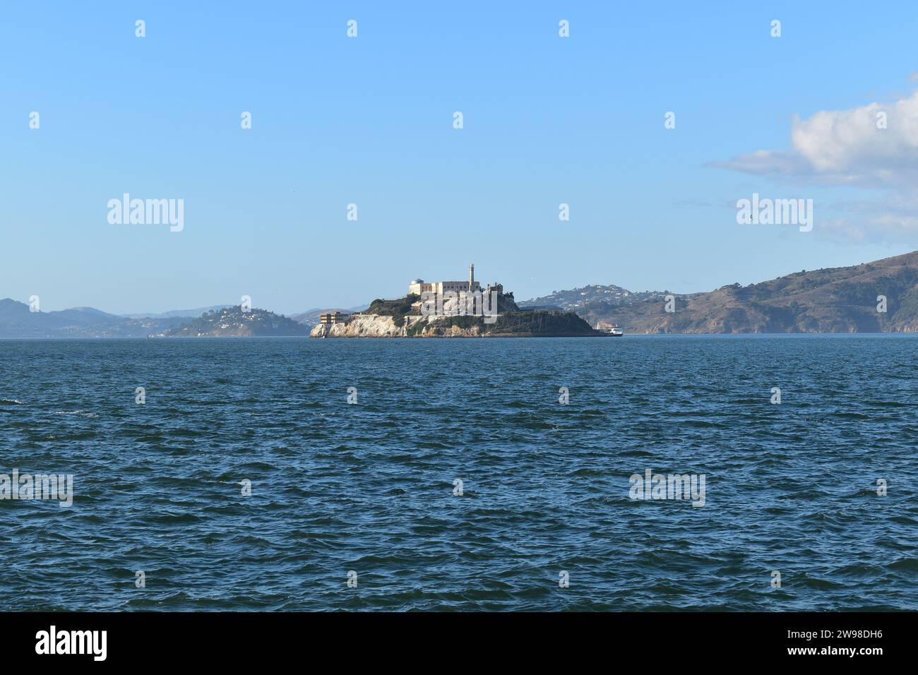 View of Alcatraz Island in the blue water of the San Francisco Bay Stock Photo