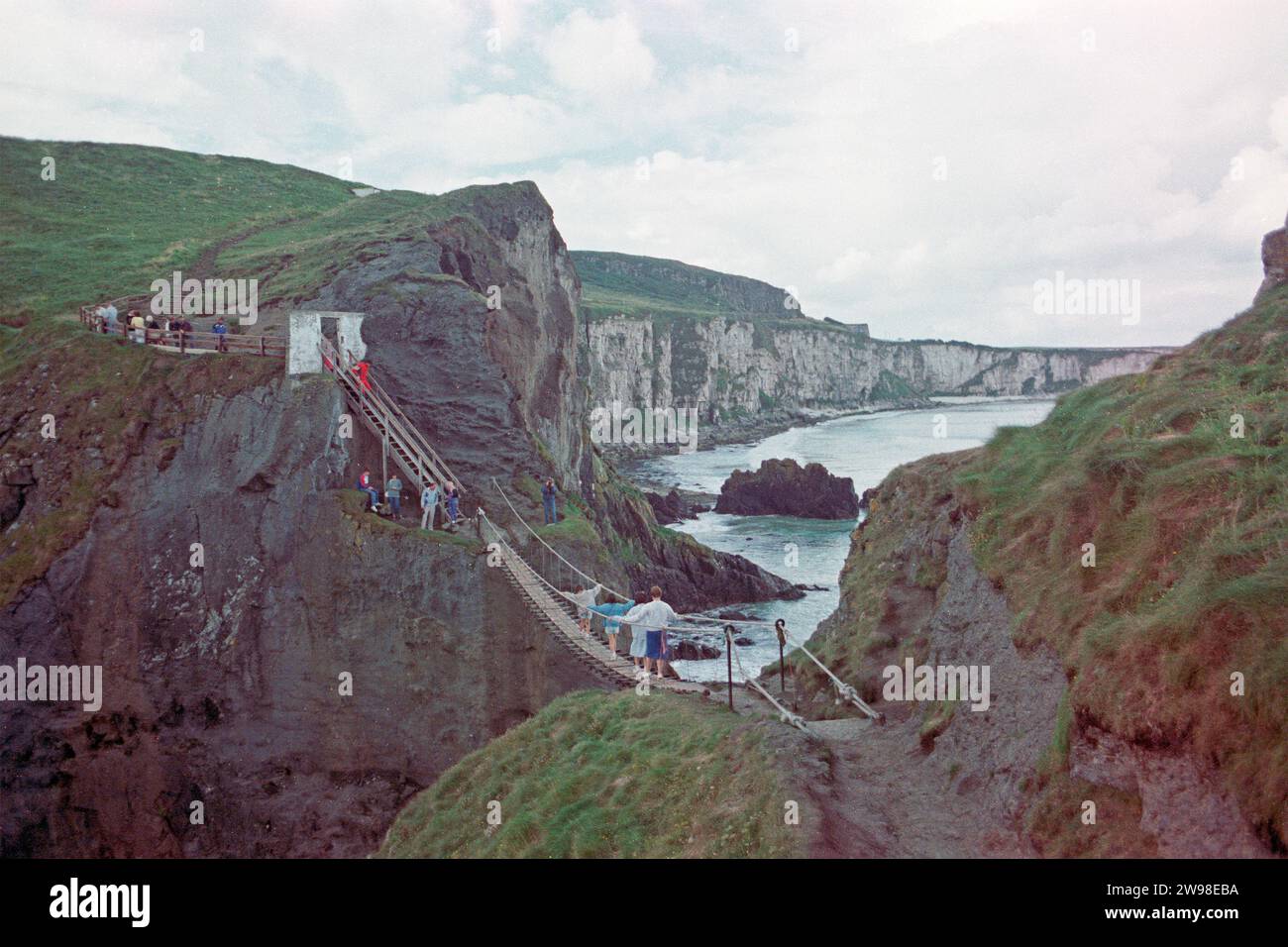 People, children, cliffs, CarrickaRede rope bridge, Ballintoy, County