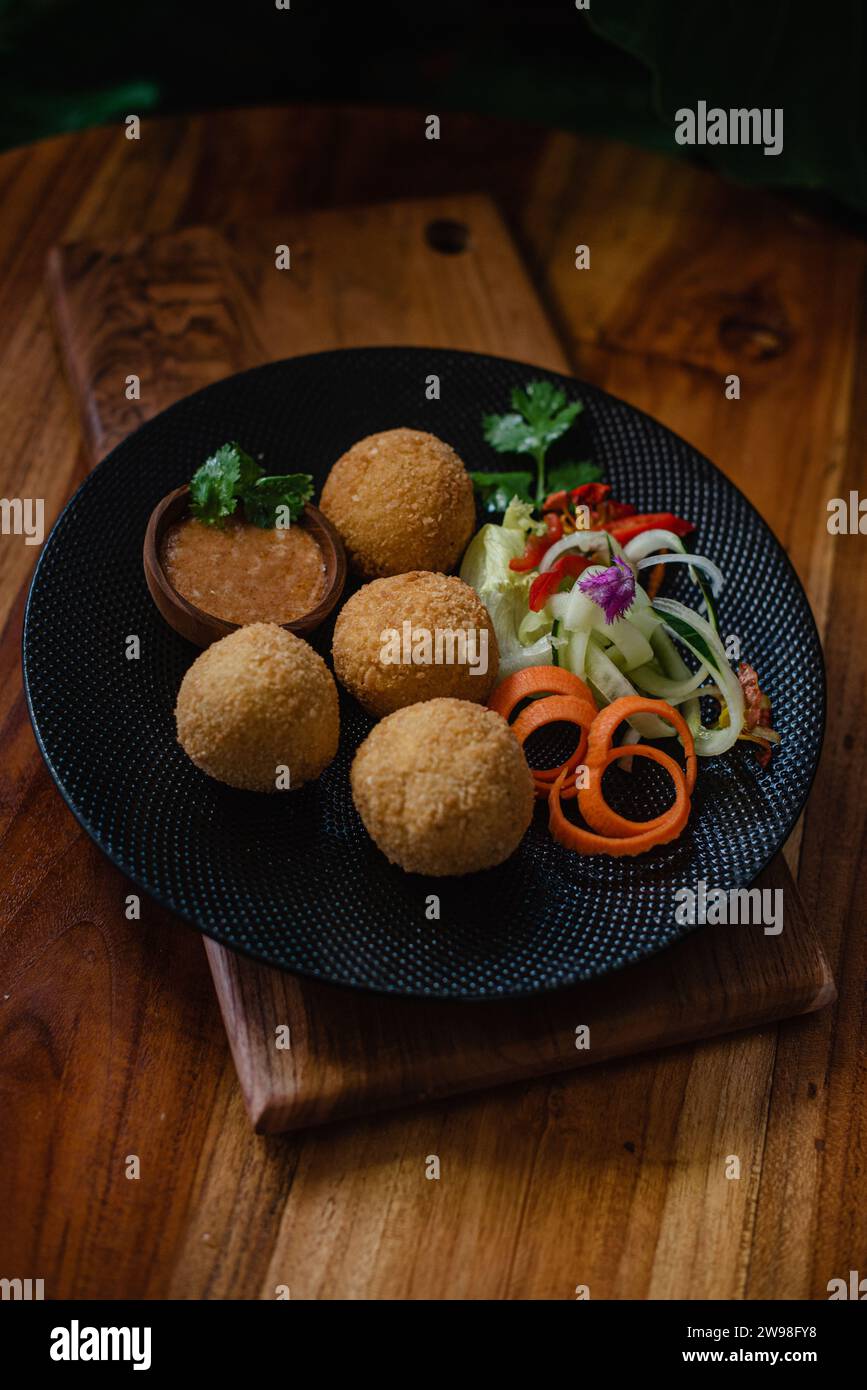 A plate of healthy and tasty food on a wooden surface Stock Photo
