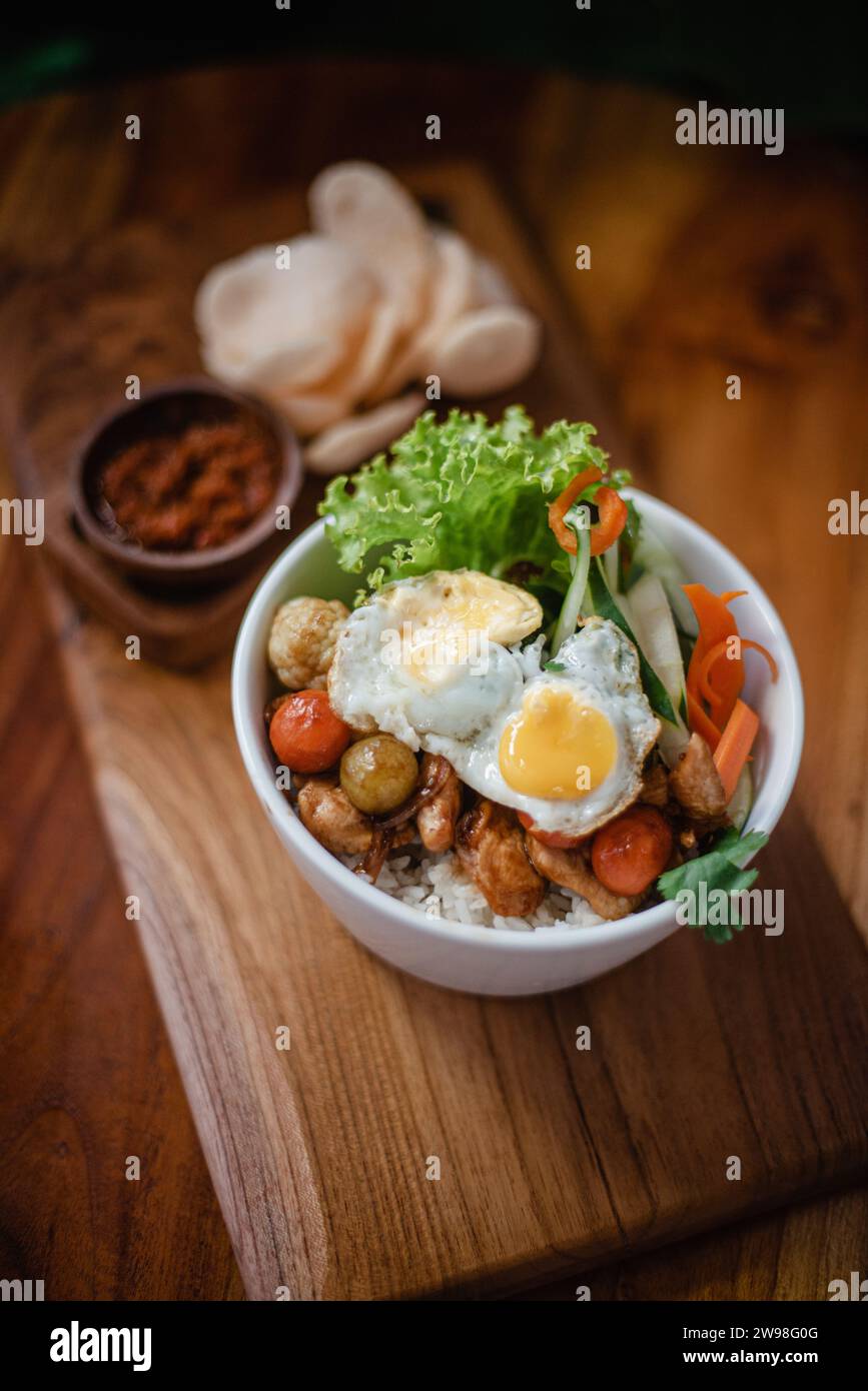 A bowl of food on a very delicious table Stock Photo