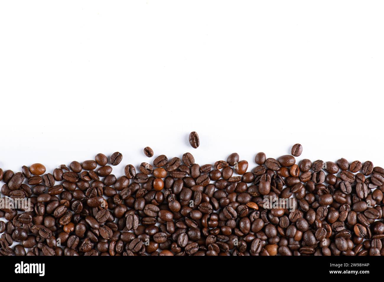 coffee beans on white background Stock Photo - Alamy
