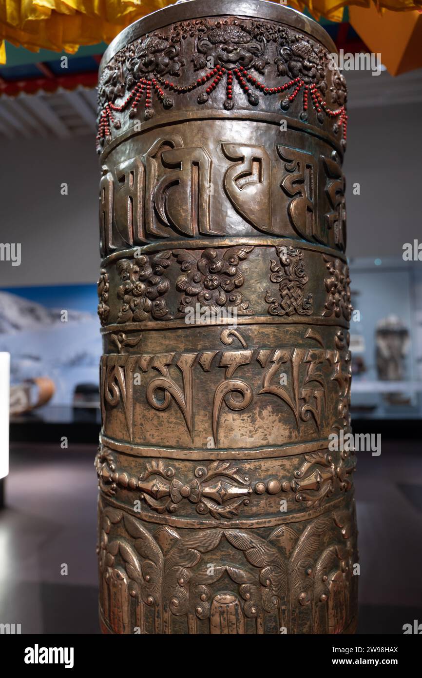 Prayer wheel from Nepal in National Museum of Scotland in Edinburgh, Scotland, UK. Stock Photo