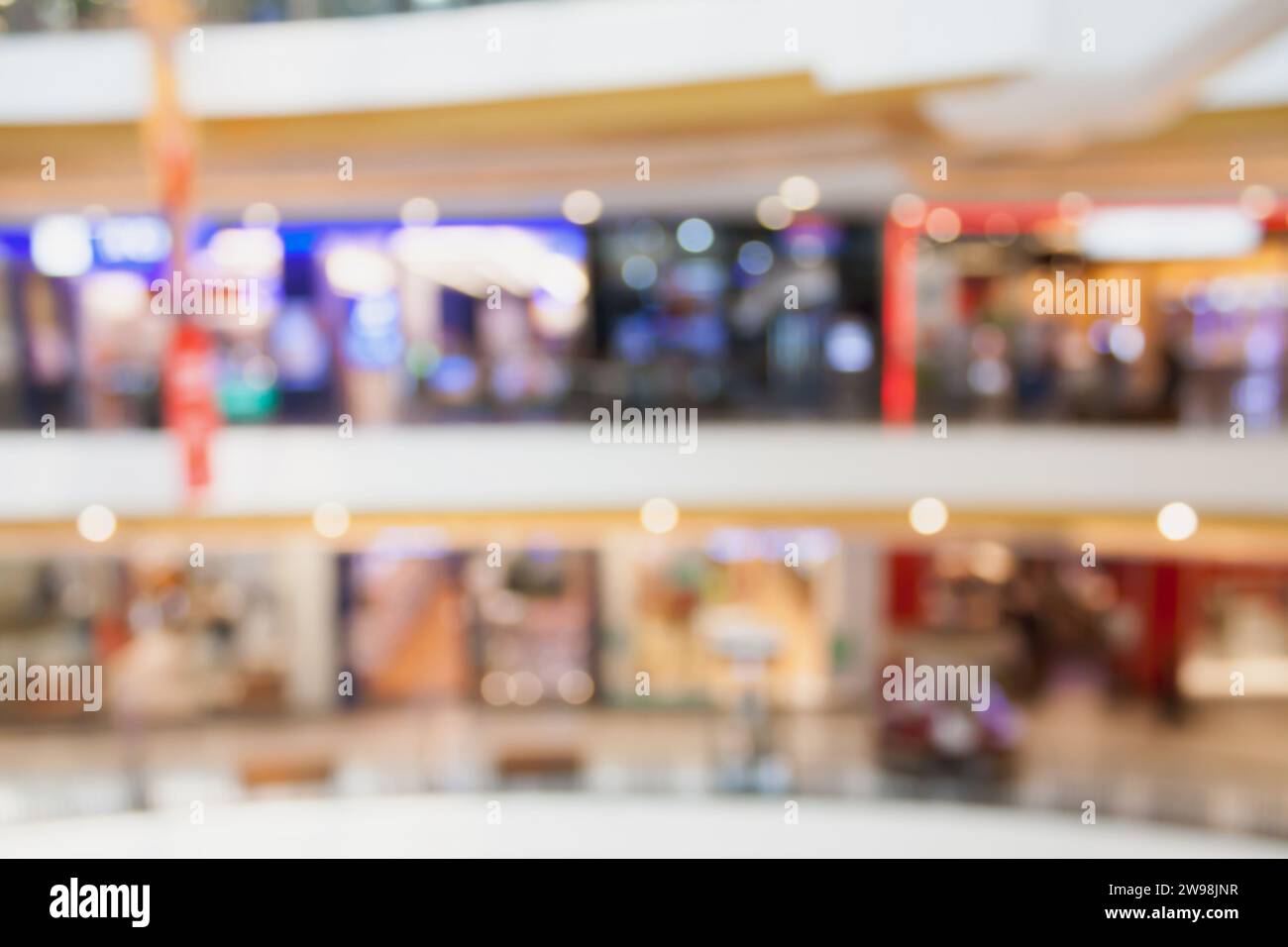 shopping mall interior blurred background Stock Photo - Alamy