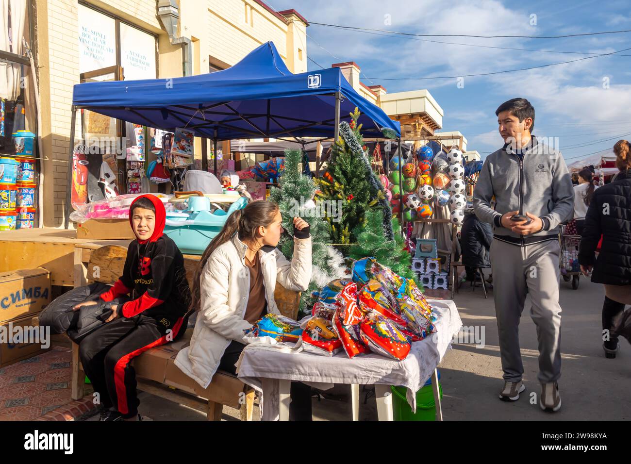 Siyob Bazaar stalls with Chrustmas decor souvenirs in  Samarkand Uzbekistan Stock Photo