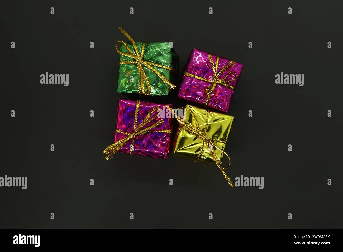 Colorful Gift boxes isolated on black background. top view. Stock Photo